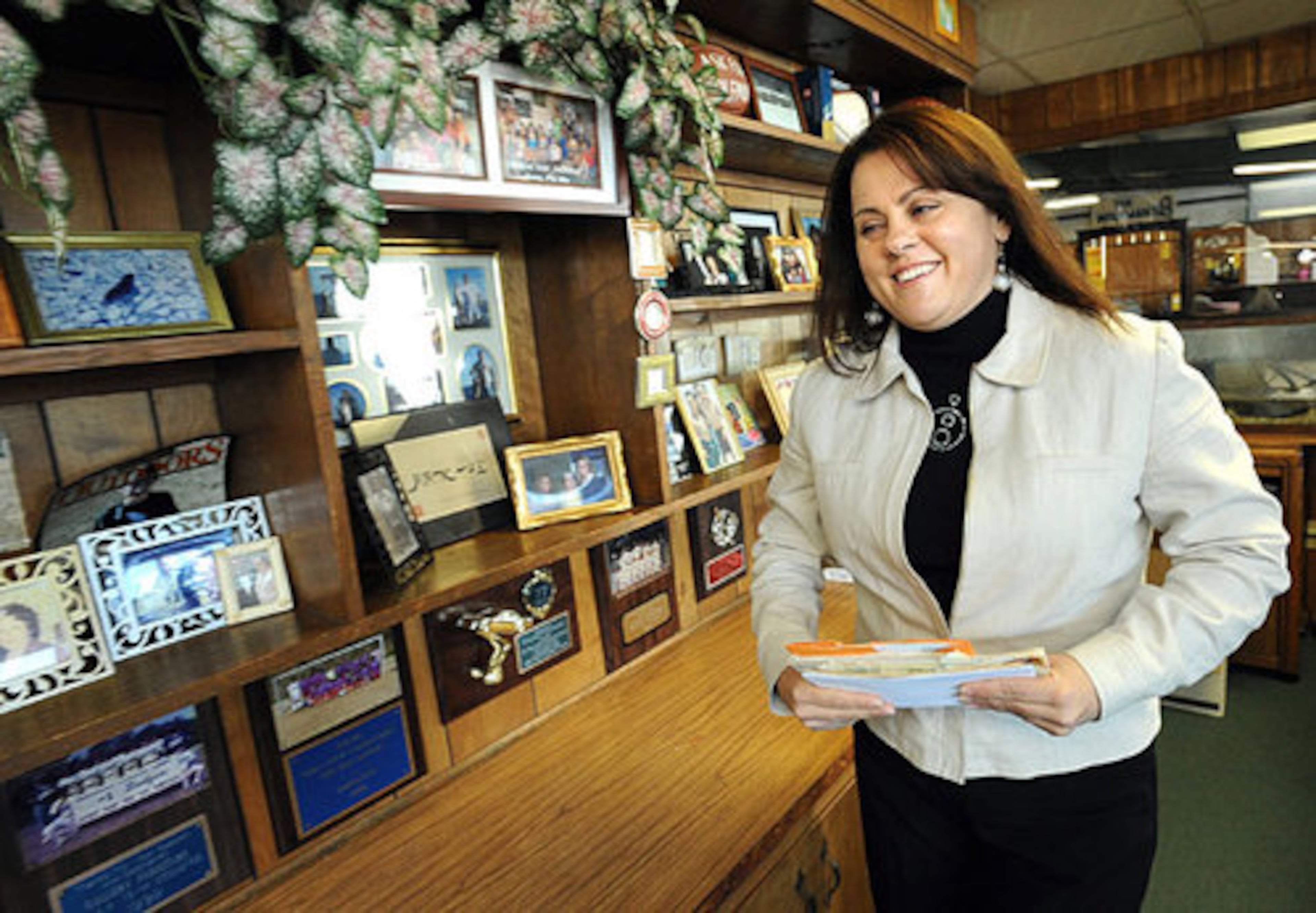 Donna Anderson estimates she and her father made more than 500 commercials over 20 years, and they played all over local TV. Her furniture store office is filled with props from old commercials, plaques and pictures of her and her family.