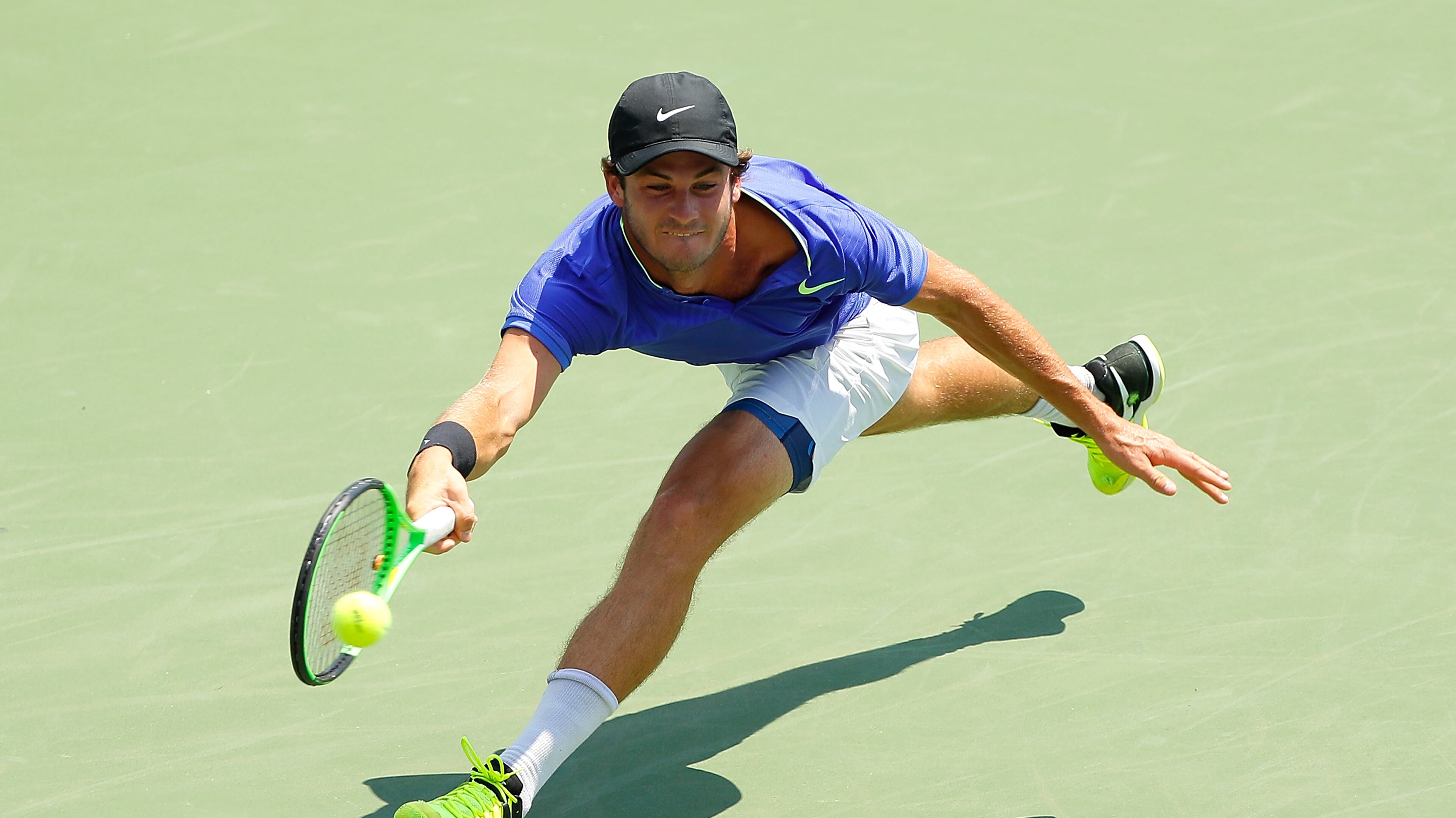 Tommy Paul returns a forehand to Malek Jaziri of Tunisia during the BB&T Atlanta Open at Atlantic Station on July 26, 2017 in Atlanta. (Photo by Kevin C. Cox/Getty Images)