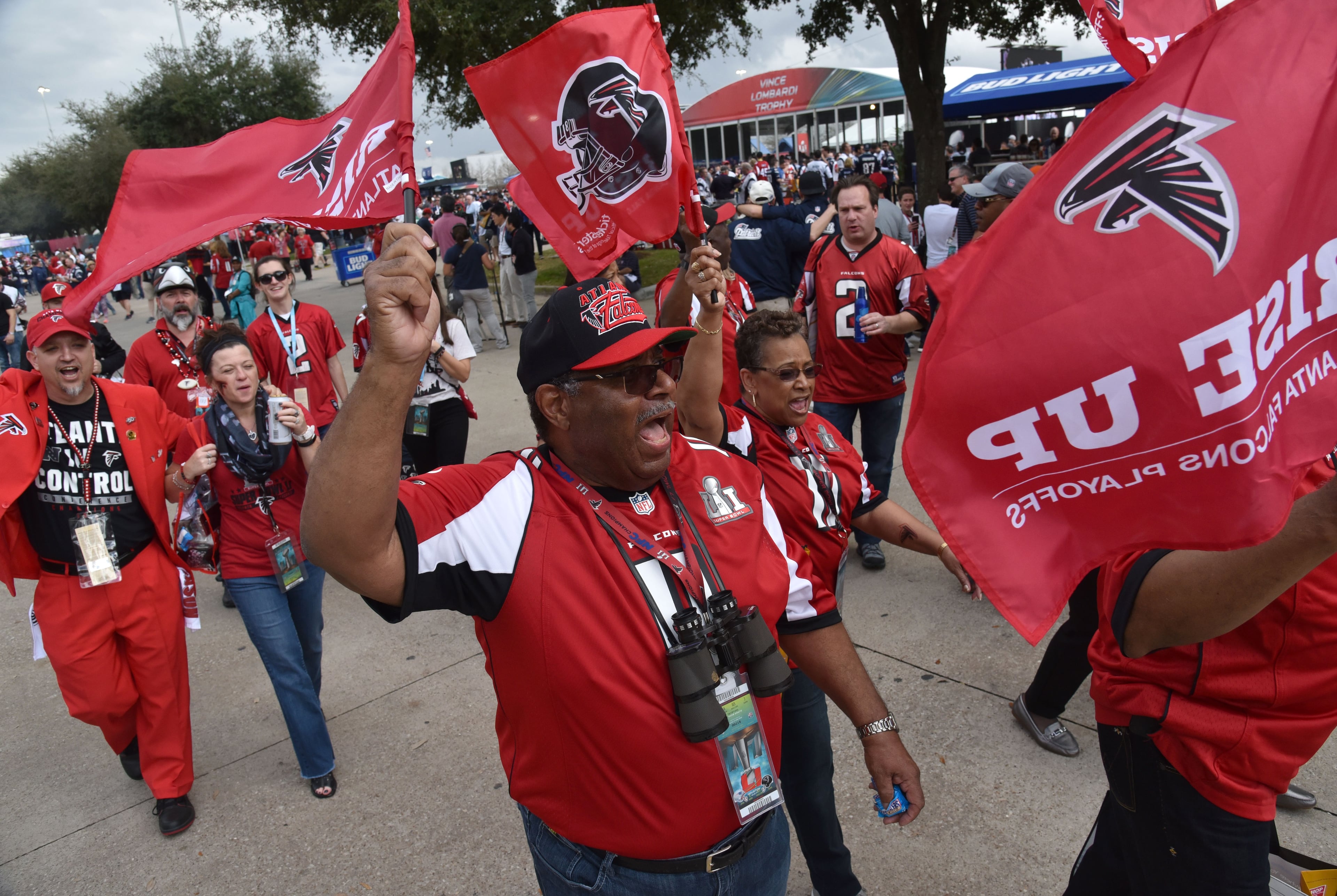 February 5, 2017 Houston, TX - Atlanta Falcons fans from Atlanta including William Cook (foreground) rally outside the NRG Stadium on Sunday, February 5, 2017. Fans gather outside NRG Stadium in Houston Texas before the game where the Atlanta Falcons faced the New England Patriots in Super Bowl 51. HYOSUB SHIN / HSHIN@AJC.COM