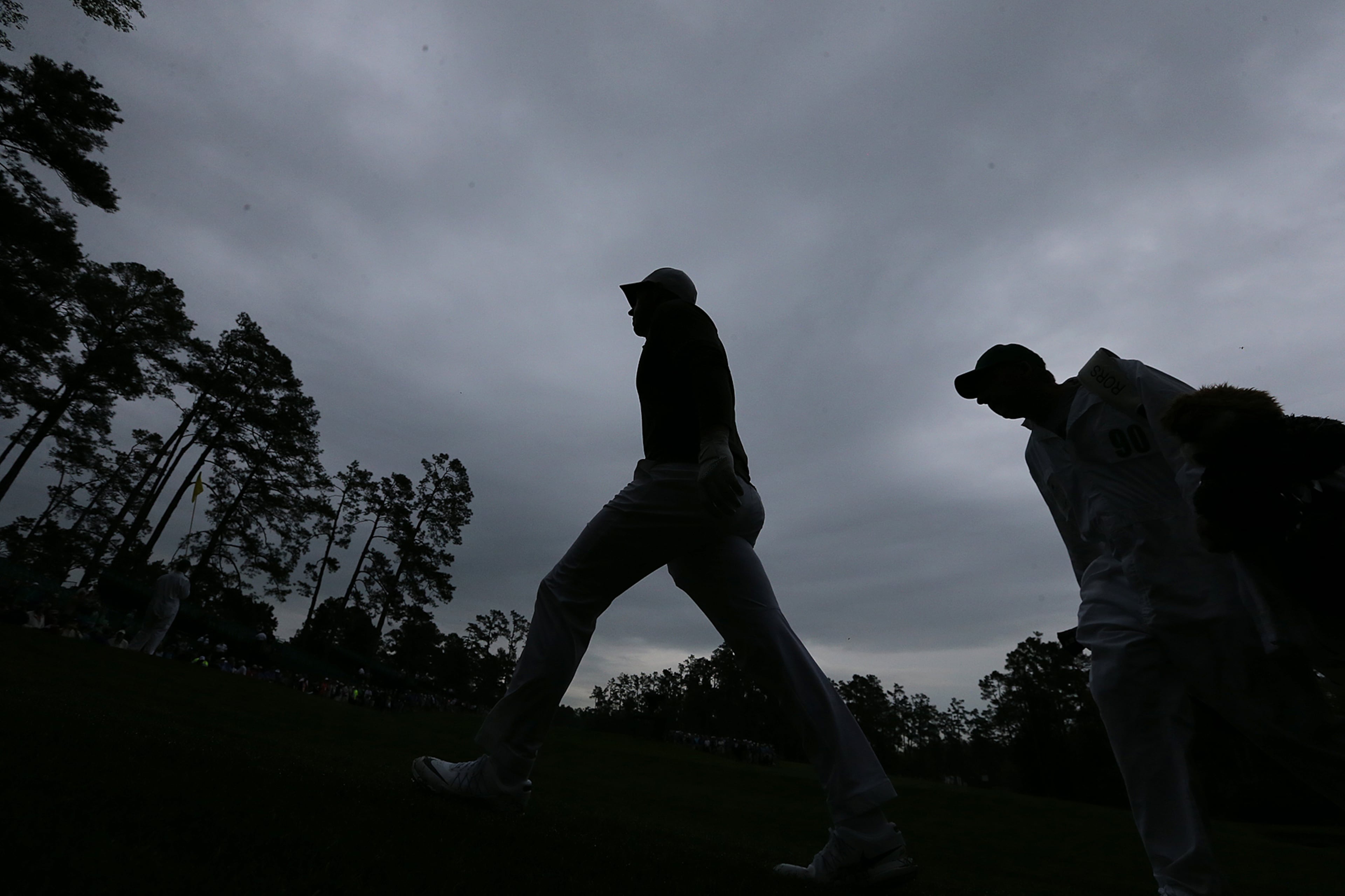 April 5, 2017, Augusta: Rory McIlroy walks to the 14th tee under a darkening sky during his practice round for the Masters at Augusta National Golf Club on Wednesday, April 5, 2017, in Augusta. Curtis Compton/ccompton@ajc.com