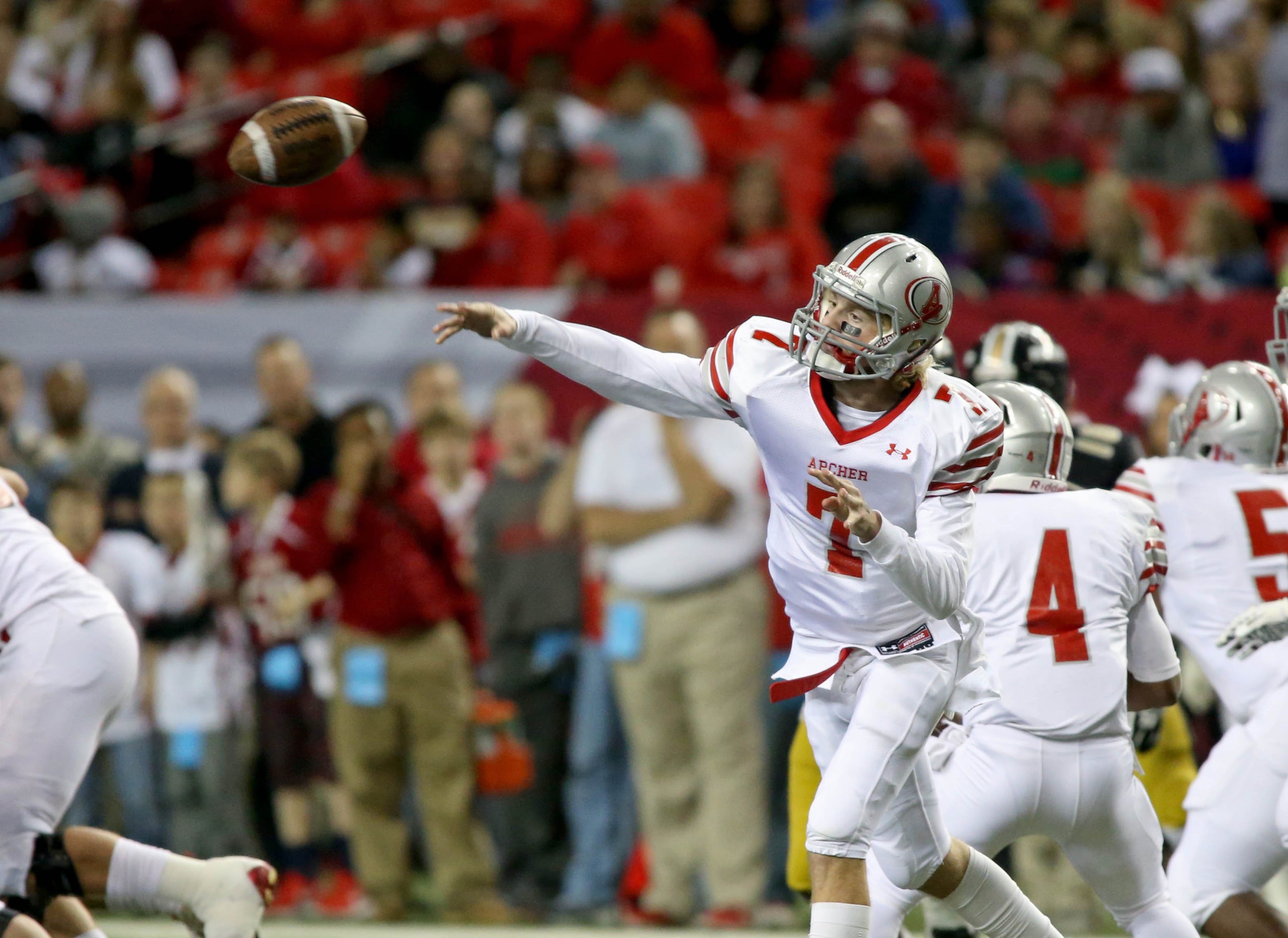 Archer quarterback Gabe Tiller (7) attempts a pass in the first half of their game against Colquitt County in the Class AAAAAA state high school football championship at the Georgia Dome Saturday in Atlanta, Ga., December 13, 2014.