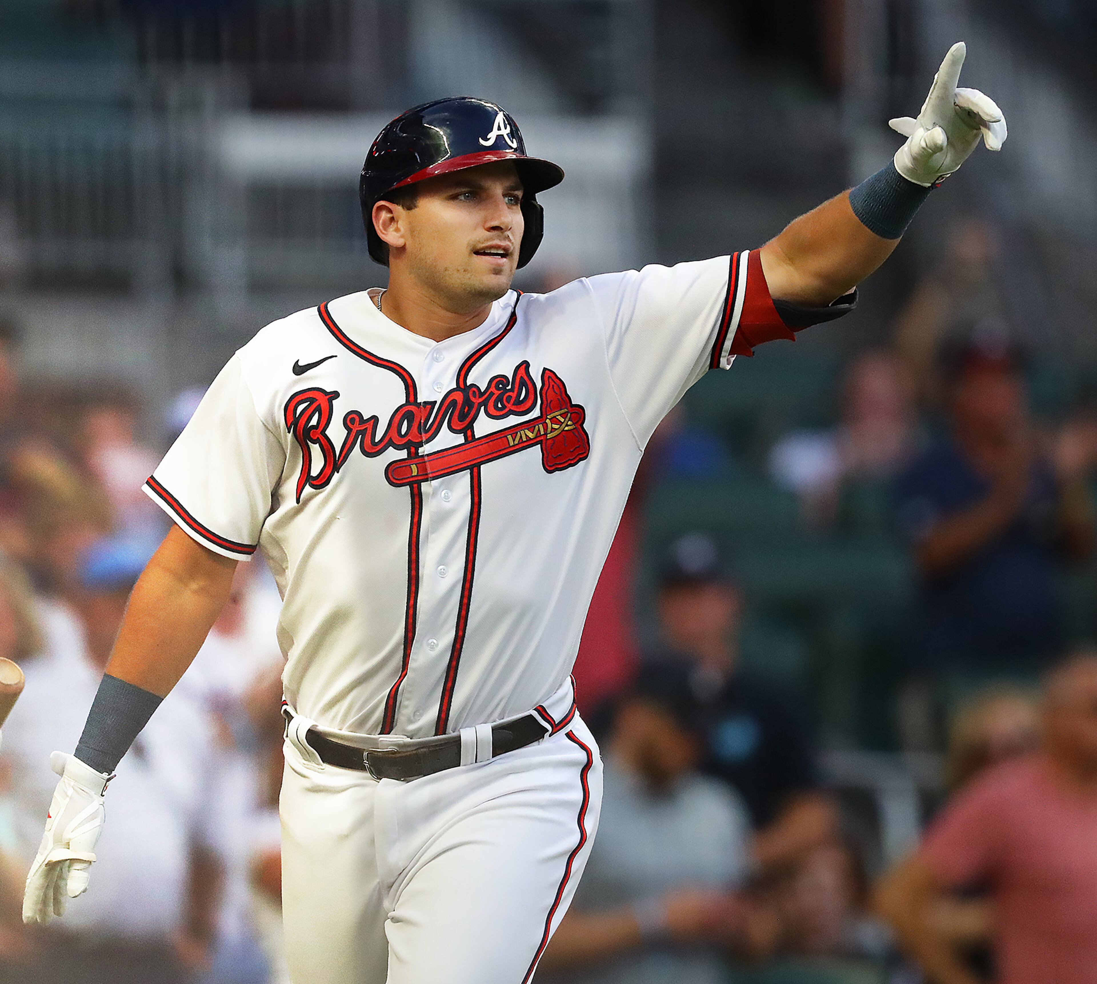 Braves third baseman Austin Riley reacts after he hit a solo home run against the Nationals on Monday night at Truist Park. (Curtis Compton / Curtis Compton@ajc.com)