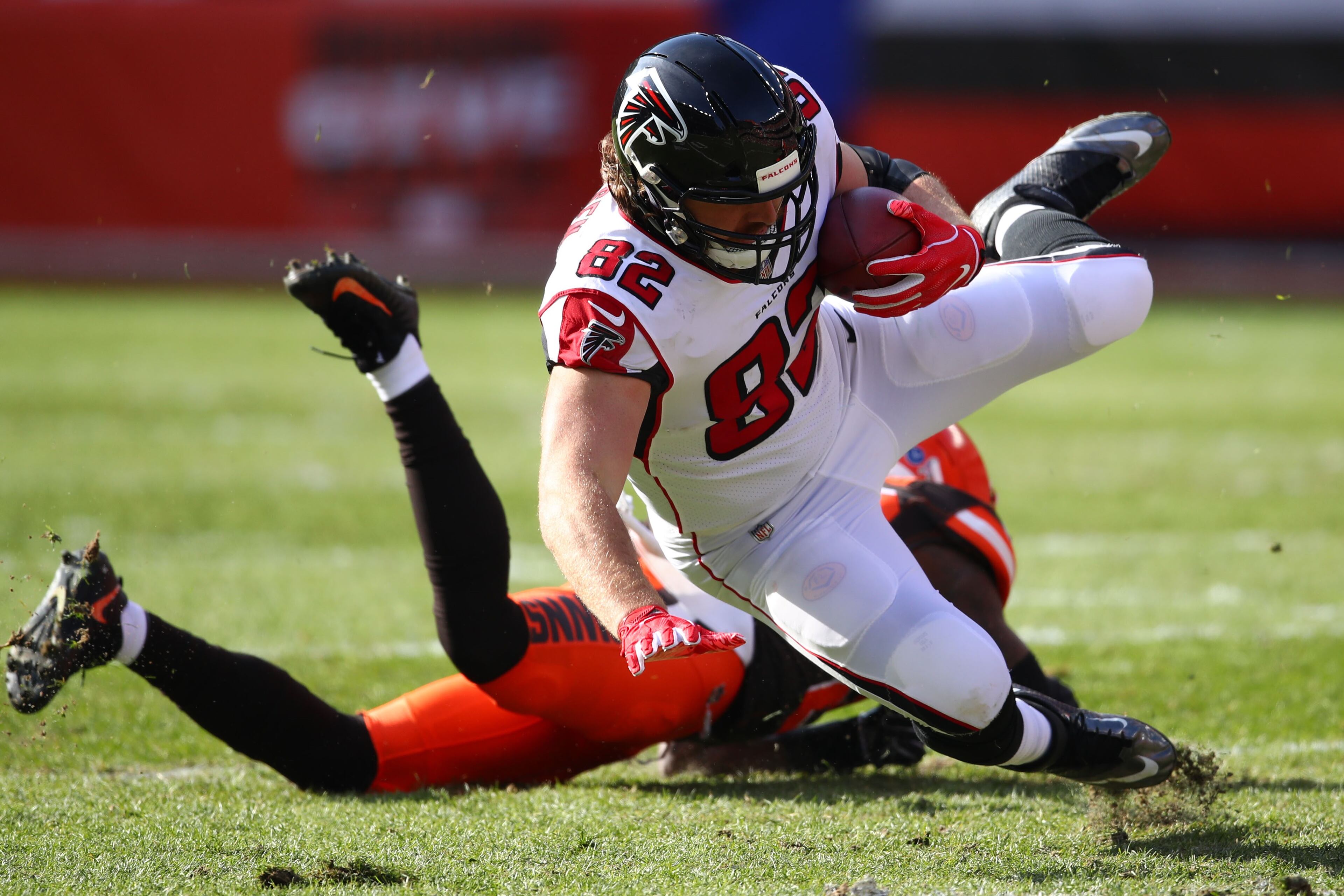 CLEVELAND, OH - NOVEMBER 11: Logan Paulsen #82 of the Atlanta Falcons hits the ground after being tackled by Derrick Kindred #26 of the Cleveland Browns in the first half at FirstEnergy Stadium on November 11, 2018 in Cleveland, Ohio. (Photo by Gregory Shamus/Getty Images)