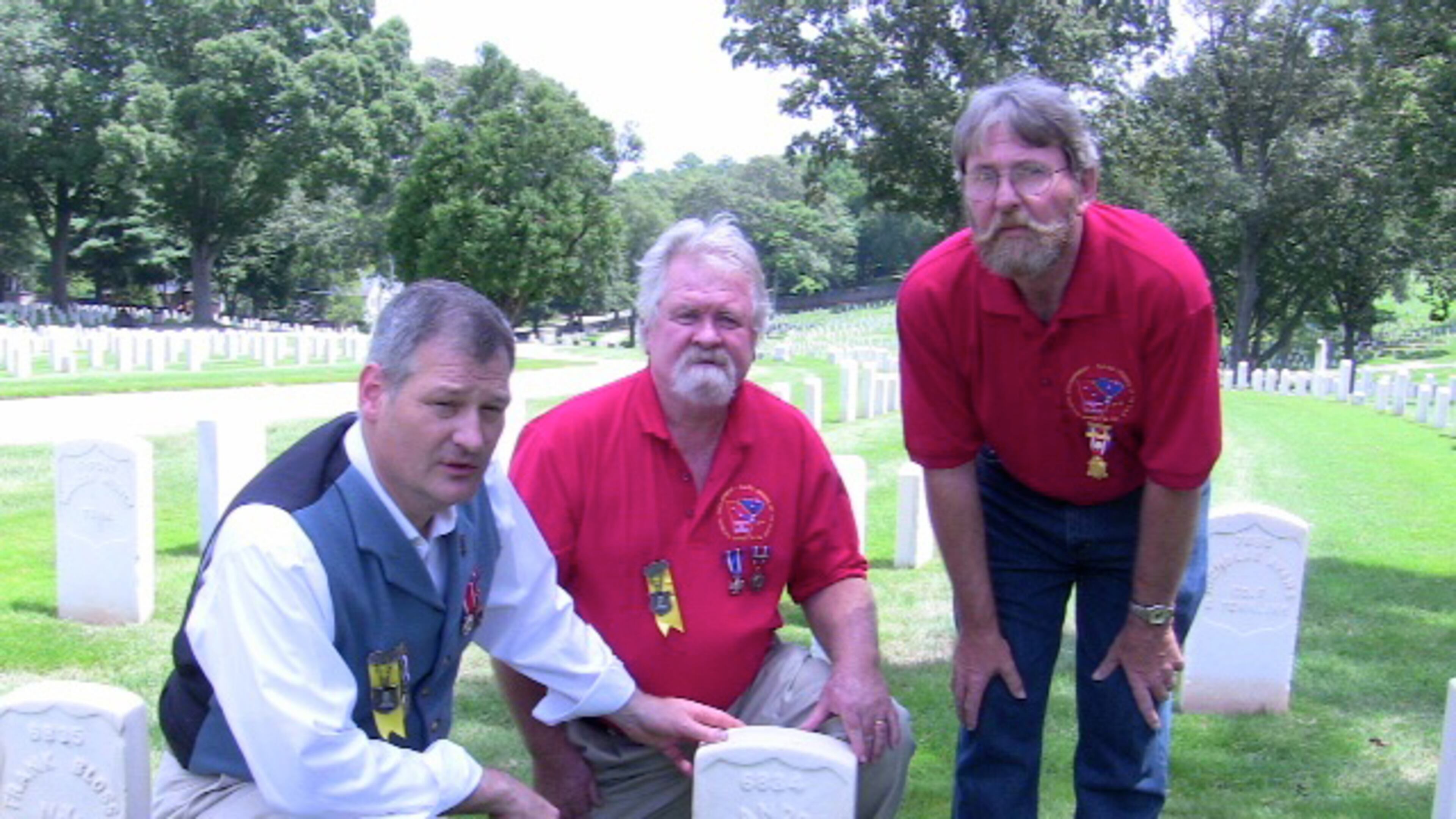 Brian Pierson of Sumter, S.C., Bill Miller of Marietta and Mark Hale of Jonesboro are active in the Sons of Union Veterans of the Civil War. They are pictured at the Marietta National Cemetery, where 10,312 Union dead are interred.