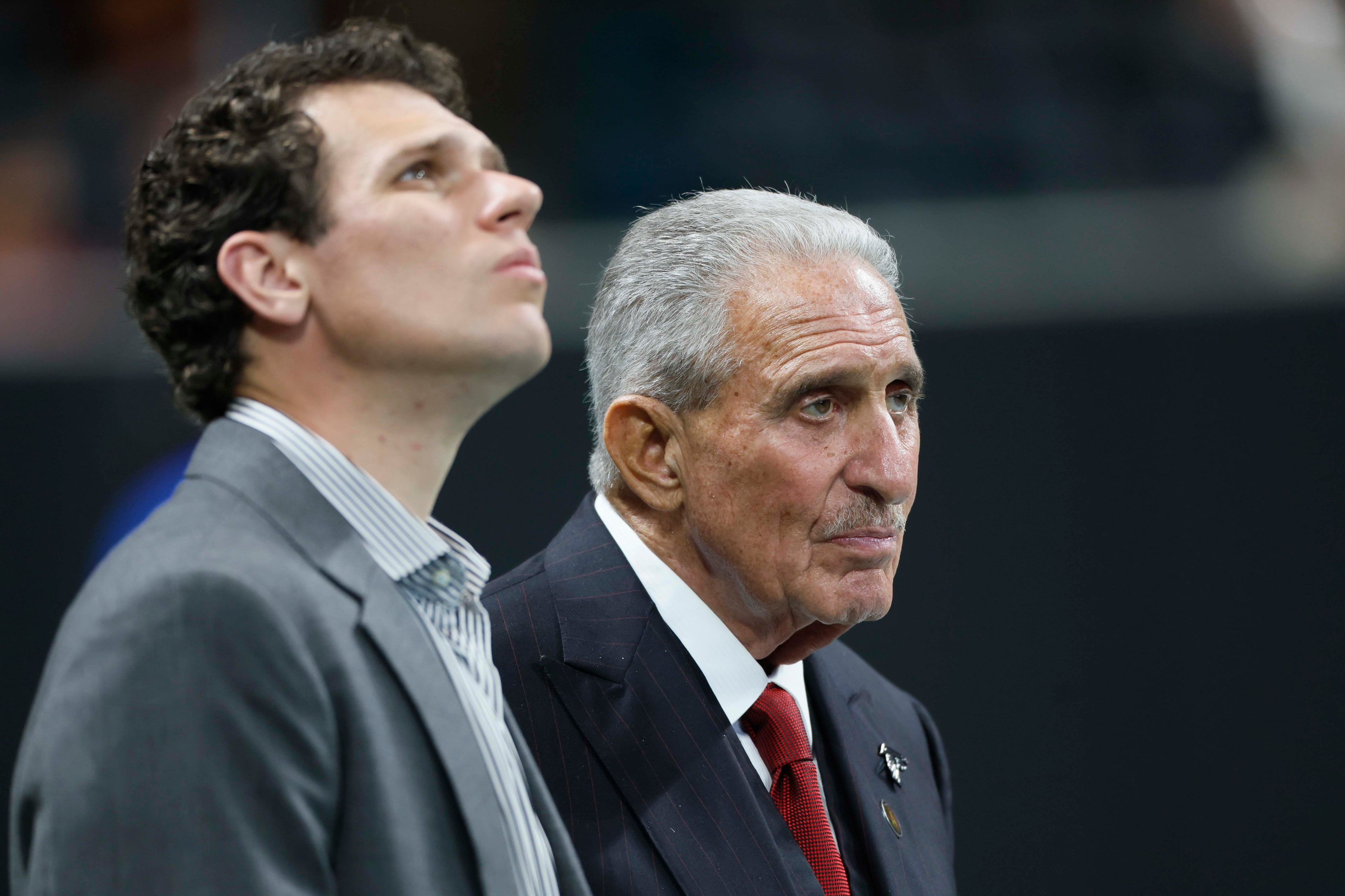 Atlanta Falcons owner Arthur Blank and his son, Joshua Blank, watch their team at the end of the second half against the Carolina Panthers at Mercedes-Benz Stadium in Atlanta on Sunday, Sept. 20, 2026. The Falcons lost 34-3. (Miguel Martinez/AJC)