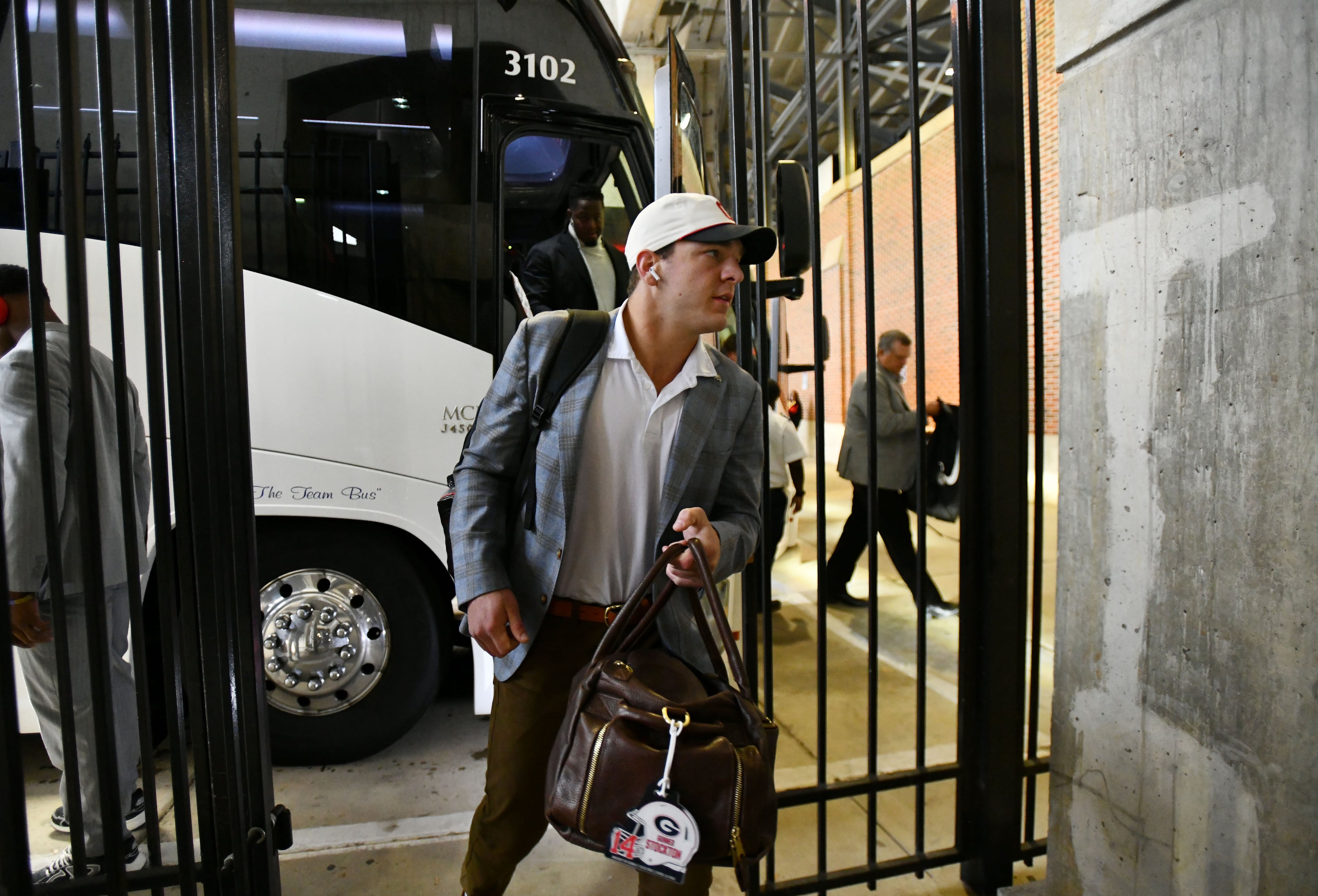 Georgia quarterback Gunner Stockton and other players arrive before an NCAA football game against Alabama at Bryant-Denny Stadium on Saturday, Oct. 10, 2026, in Tuscaloosa, Alabama. (Hyosub Shin/AJC)