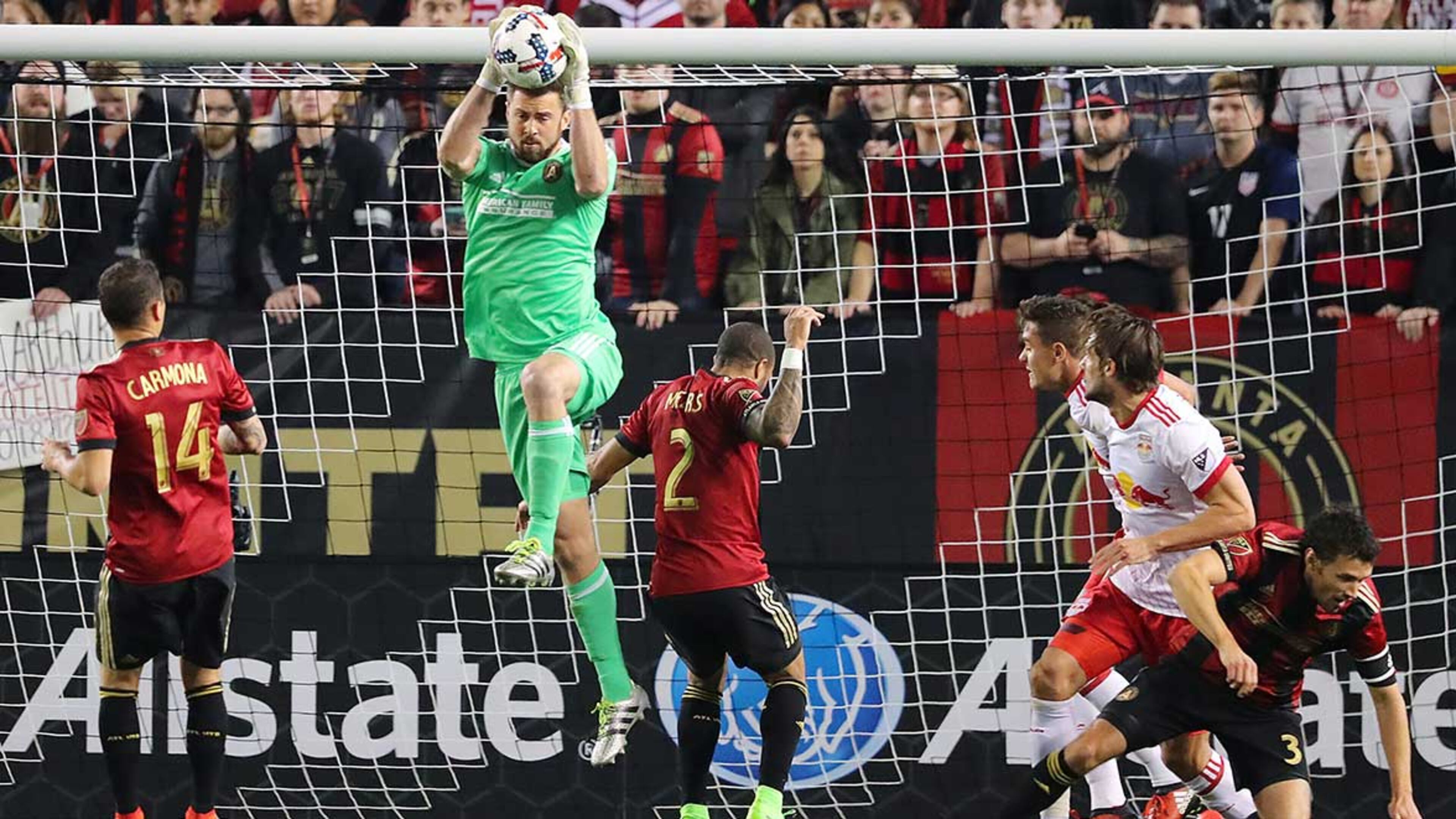 Atlanta United goalkeeper Alec Kann saves a shot during Sunday's game.