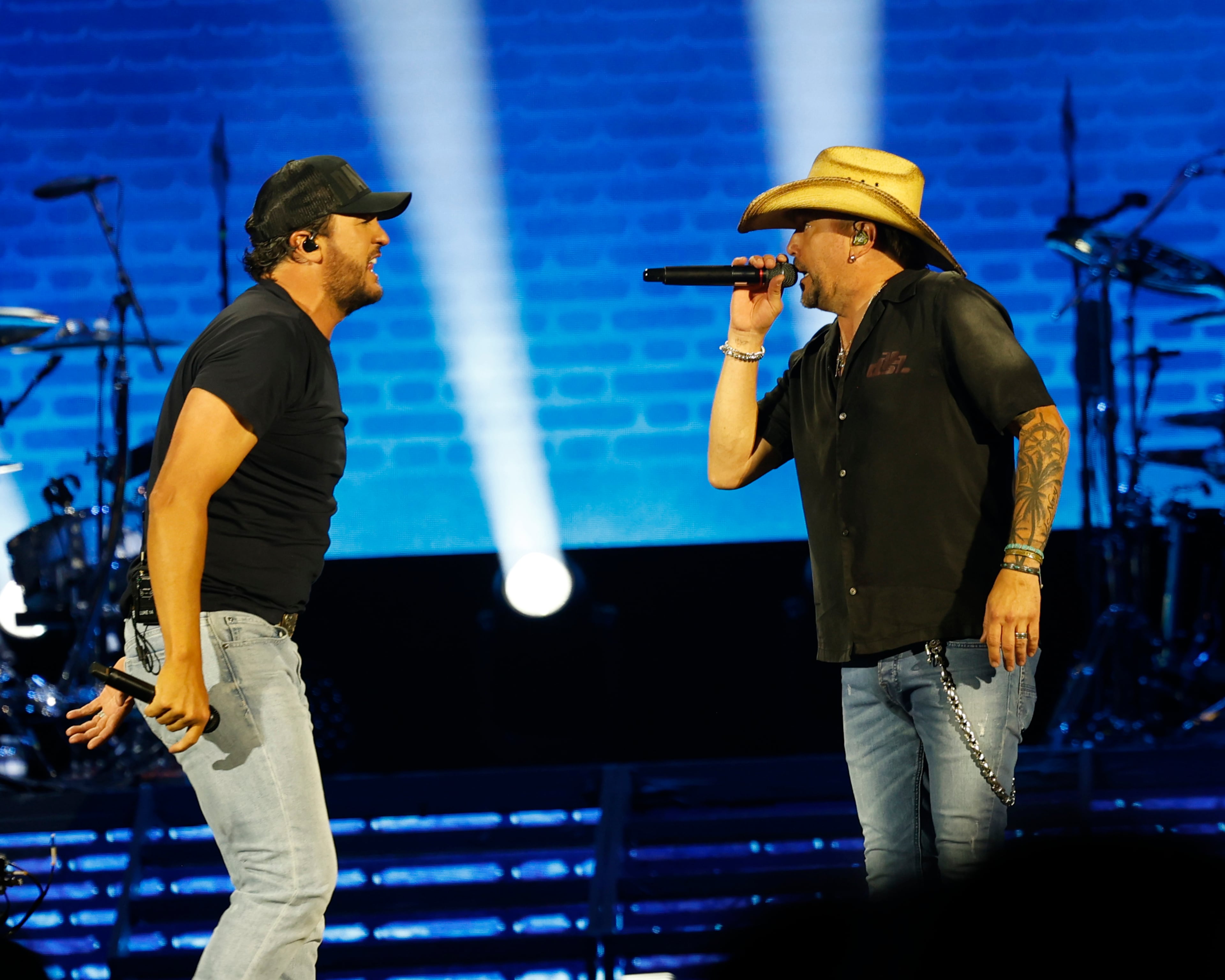 Georgia natives Jason Aldean (right) and Luke Bryan perform together for the first "Live Between the Hedges Concert Presented by PruittHealth" at Sanford Stadium, home to the University of Georgia football team, on Saturday, April 25, 2026, in Athens. This is just the second concert in the stadium’s nearly 100-year history. (Akili-Casundria Ramsess/EyeAkili Media)