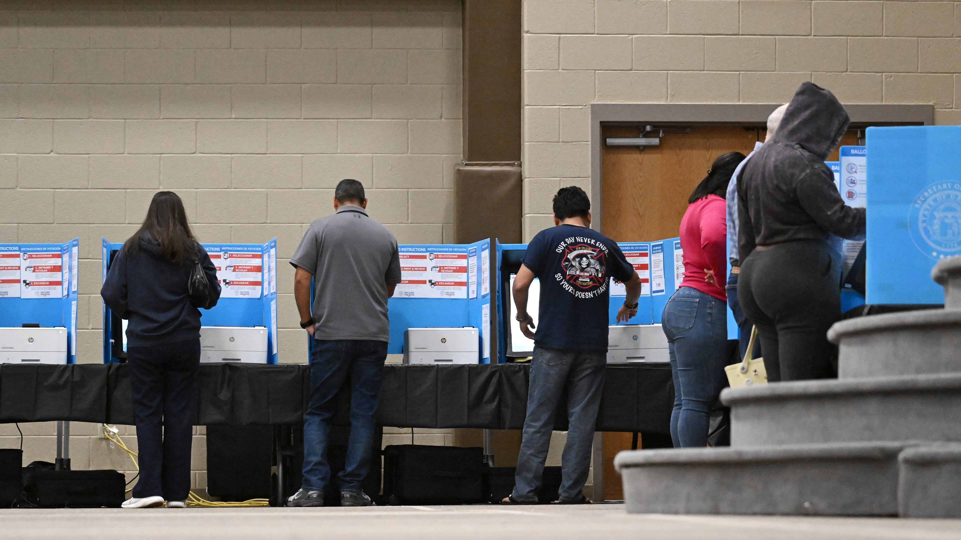 Gwinnett County voters cast their ballots on Election Day at Gracepointe Church of the Nazarene in Loganville in 2024. (Hyosub Shin/AJC)