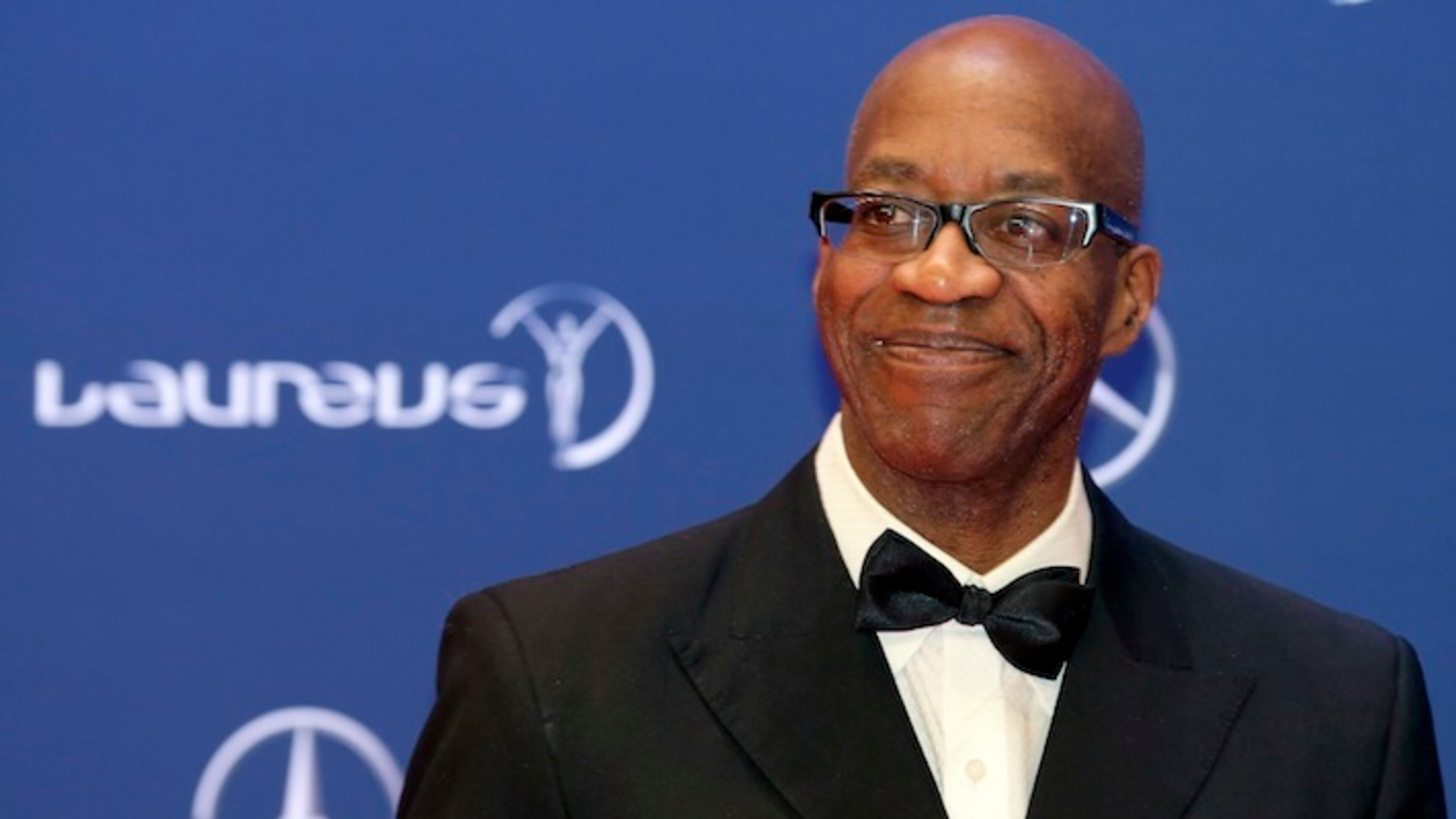 FILE - In this April 18, 2016, file photo, Edwin Moses poses for photos as he arrives for the Laureus World Sports Awards in Berlin, Germany. Three months after suffering the second of two traumatic head injuries in the span of six weeks, Edwin Moses is nearing 100 percent again. It's been an amazing recovery for one of America's best-known Olympic stars, and a man who is no stranger to making the impossible seem possible. (AP Photo/Markus Schreiber, File)