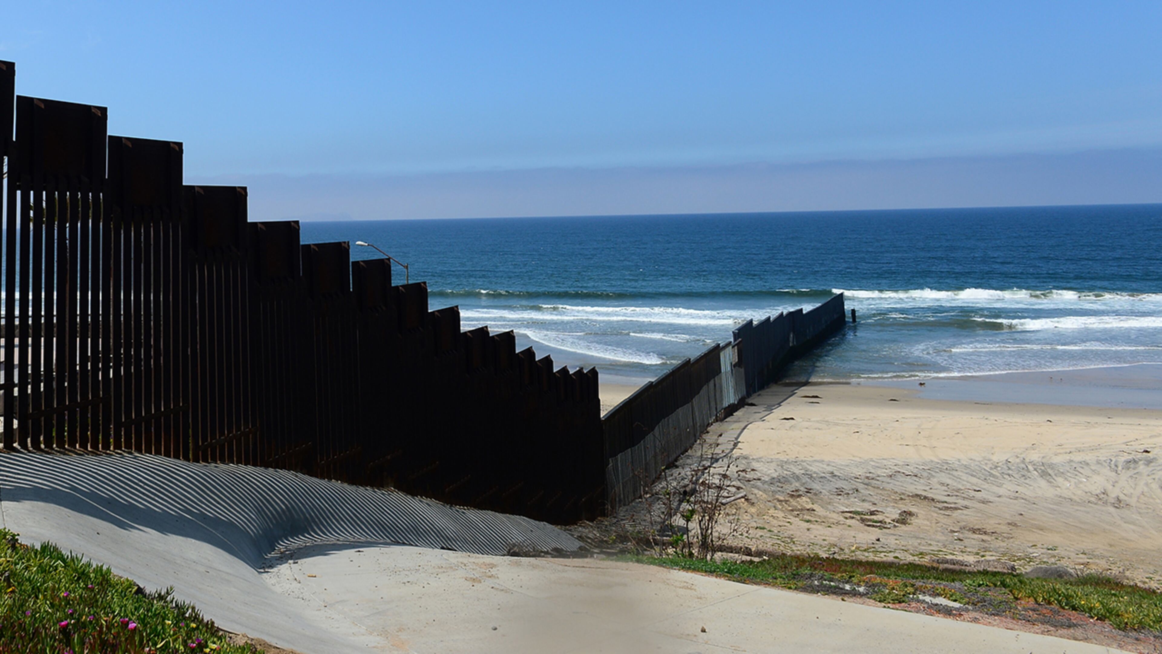 The US-Mexico 'border-fence' runs some three hundred feet into the Pacific Ocean in this most southwestern corner of the mainland United States, across from Playas de Tijuana, Mexico (FREDERIC J. BROWN/AFP/Getty Images)