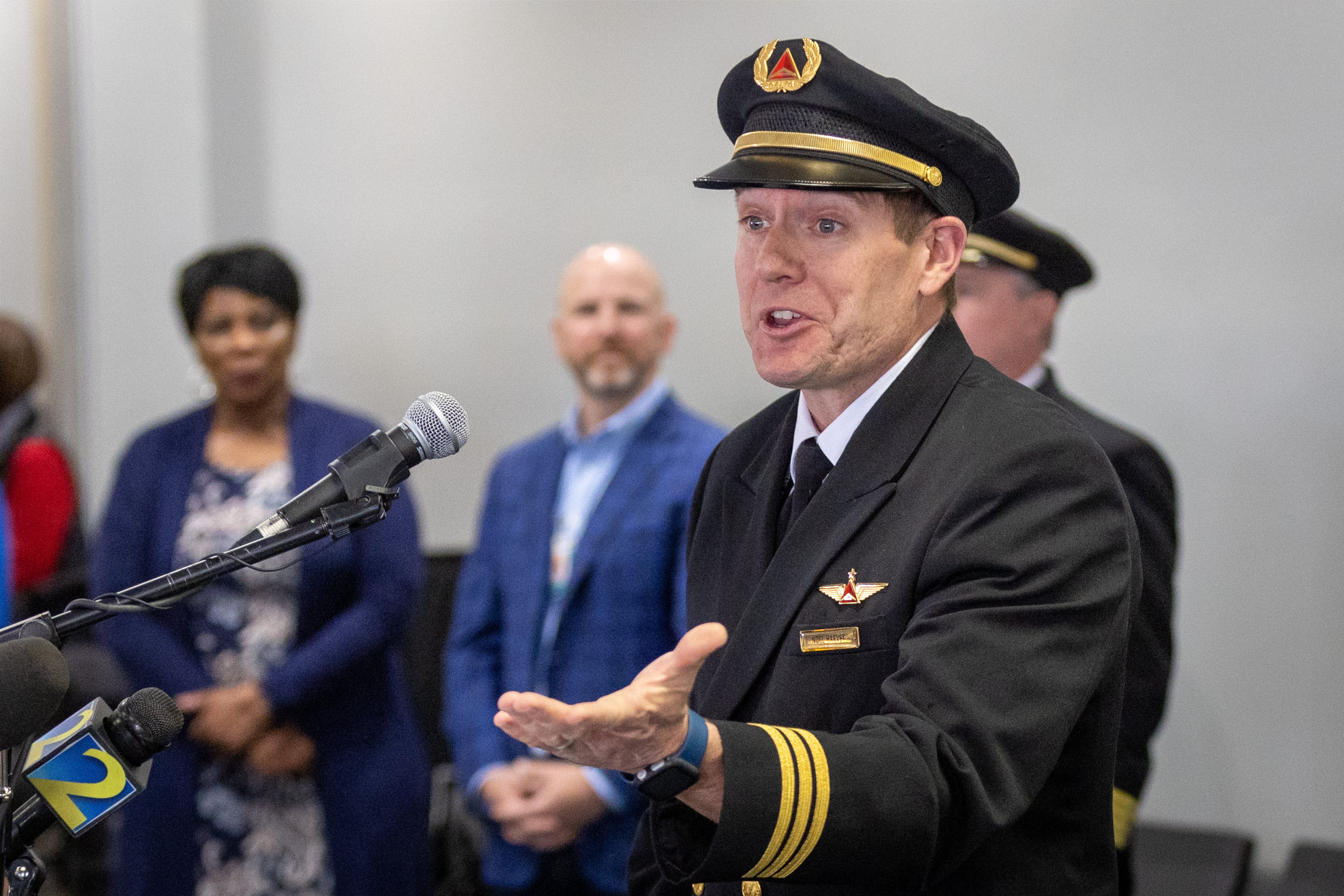 Delta pilot Noel Harvey talks to the crowd during a Wings For All event at the Hartsfield-Jackson Atlanta International Airport T Tuesday, April 11, 2023. (Steve Schaefer/steve.schaefer@ajc.com)