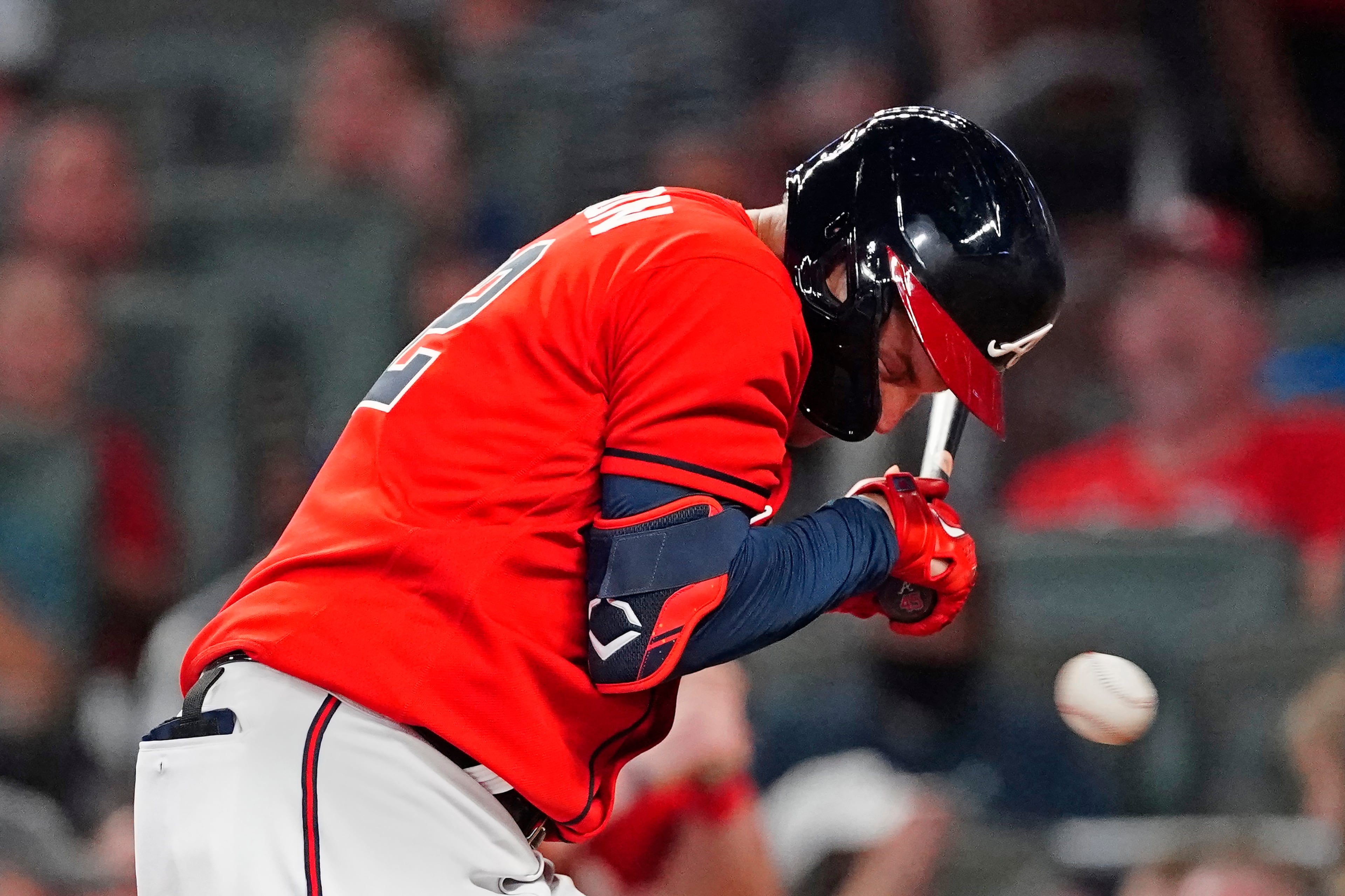 Atlanta Braves' Joc Pederson avoids being hit by a pitch from Washington Nationals reliever Sam Clay during the fifth inning of a baseball game Friday, Aug. 6, 2021, in Atlanta. (AP Photo/John Bazemore)
