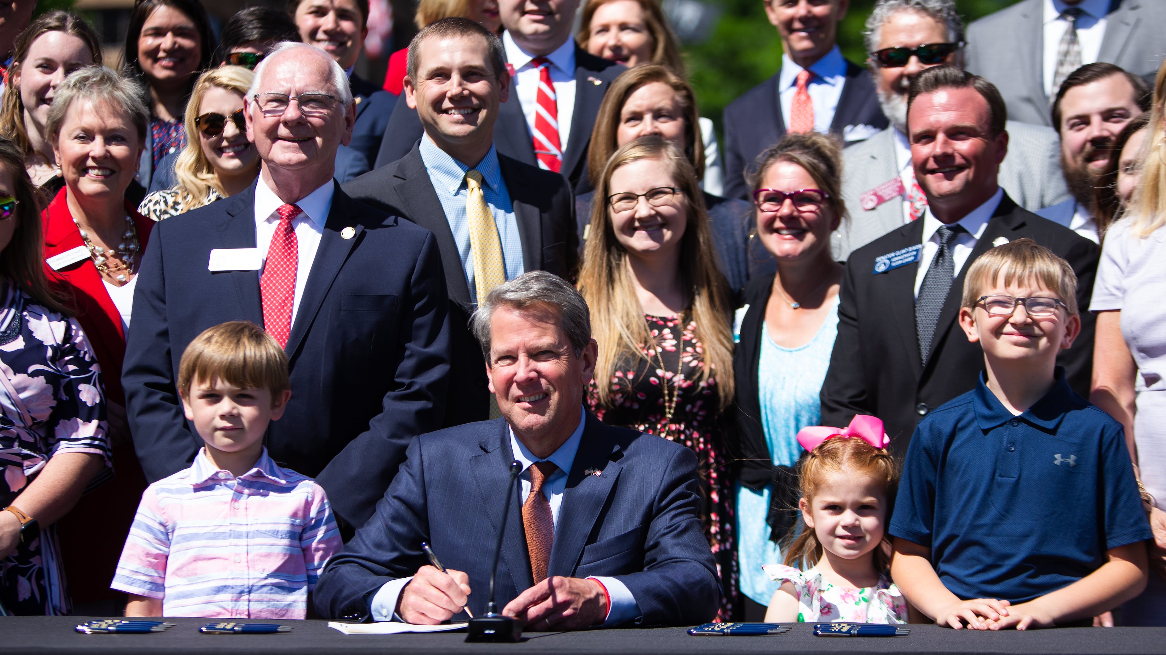 Gov. Brian Kemp attends the Children, Family and School Choice Bill Signing Ceremony on Thursday, May 6, 2021, in Liberty Plaza at the Georgia State Capitol in Atlanta. One size does not fit all when it comes to learning, writes Nicole P. Doyle. (Christina Matacotta for the AJC 2021)