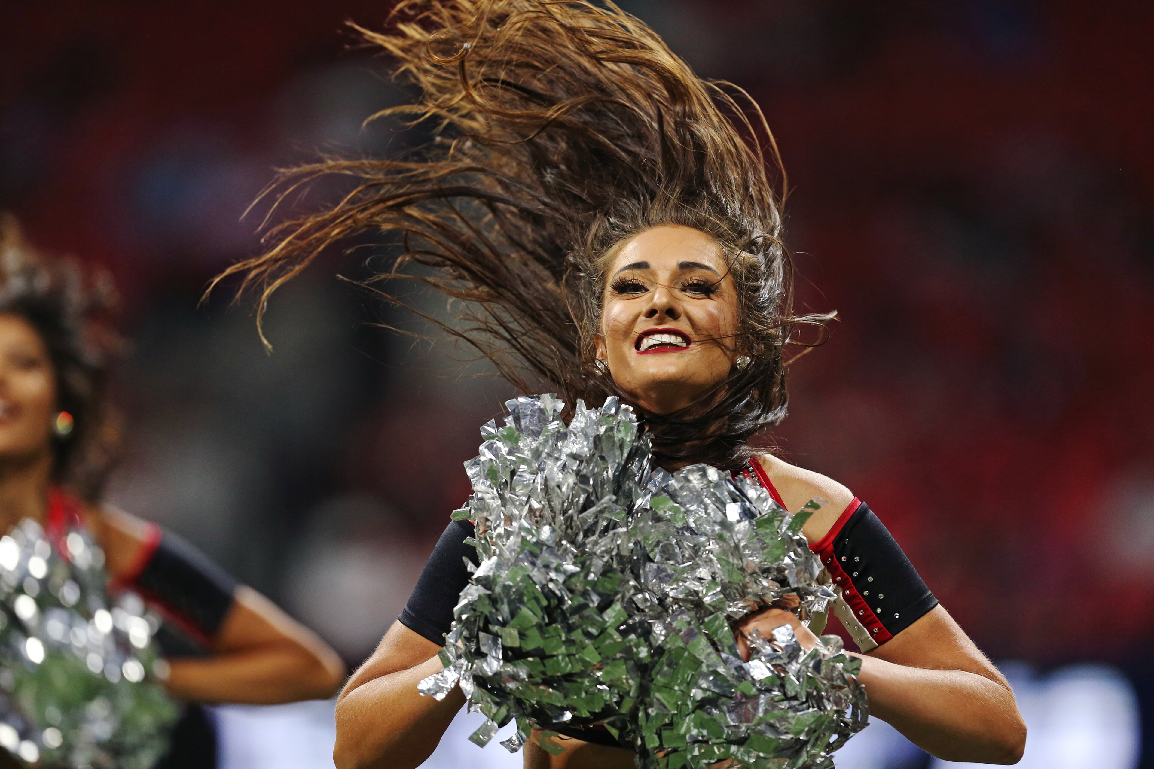 A Falcons cheerleader dances. Christina Matacotta/Christina.Matacotta@ajc.com