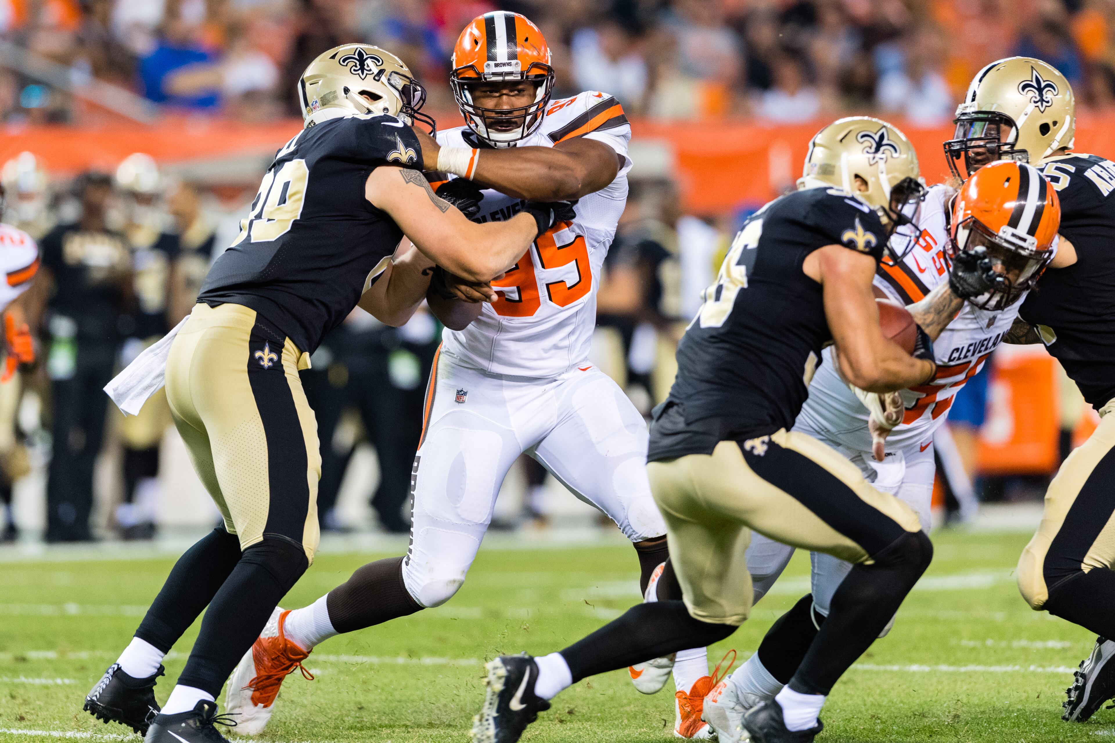 CLEVELAND, OH - AUGUST 10: Tight end Josh Hill #89 of the New Orleans Saints blocks defensive end Myles Garrett #95 of the Cleveland Browns during the first half of a preseason game at FirstEnergy Stadium on August 10, 2017 in Cleveland, Ohio. (Photo by Jason Miller/Getty Images)