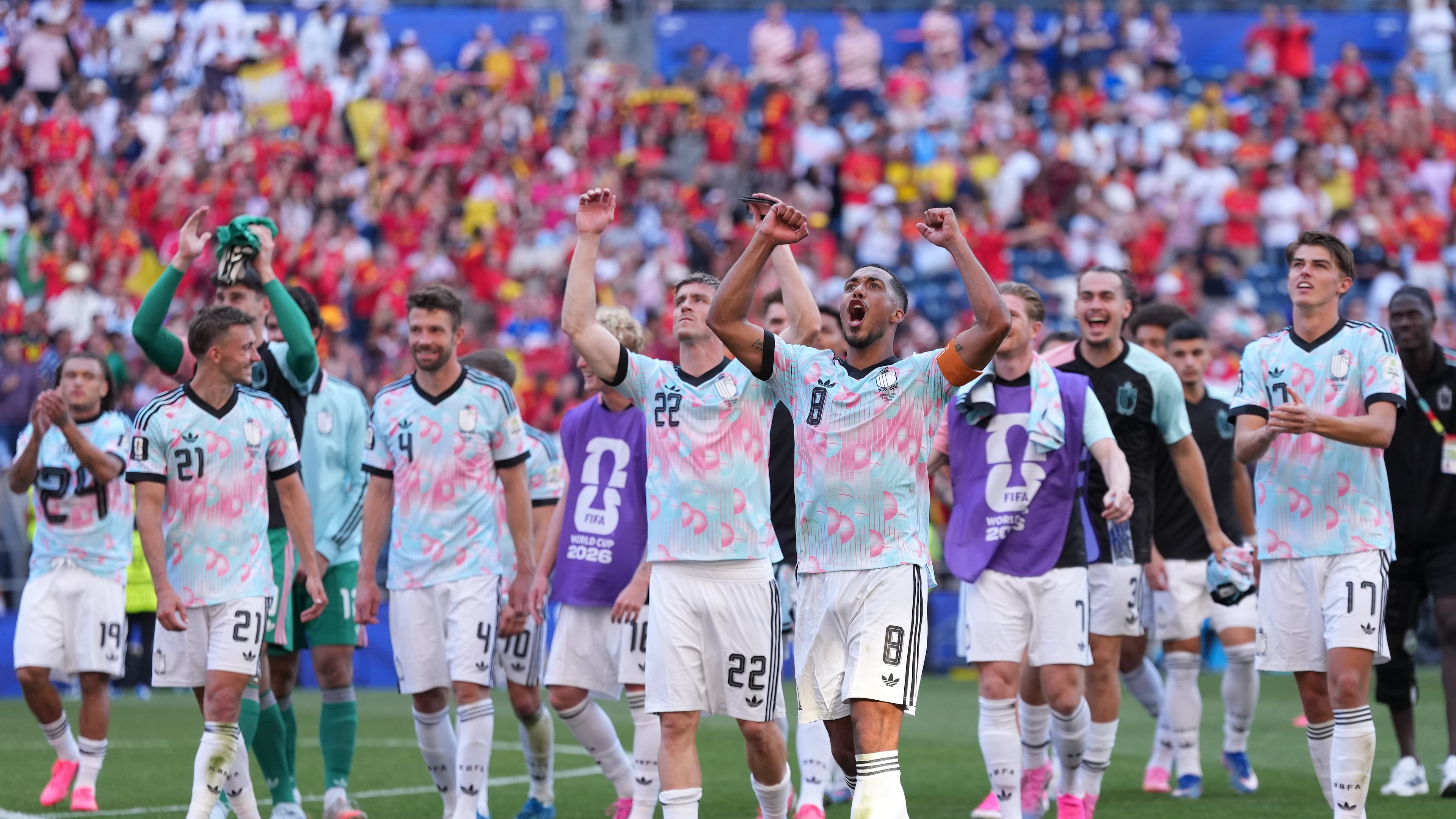 Belgium players celebrate after they won a World Cup round of 16 soccer match against the United States in Seattle, Monday, July 6, 2026. (AP Photo/Abbie Parr)