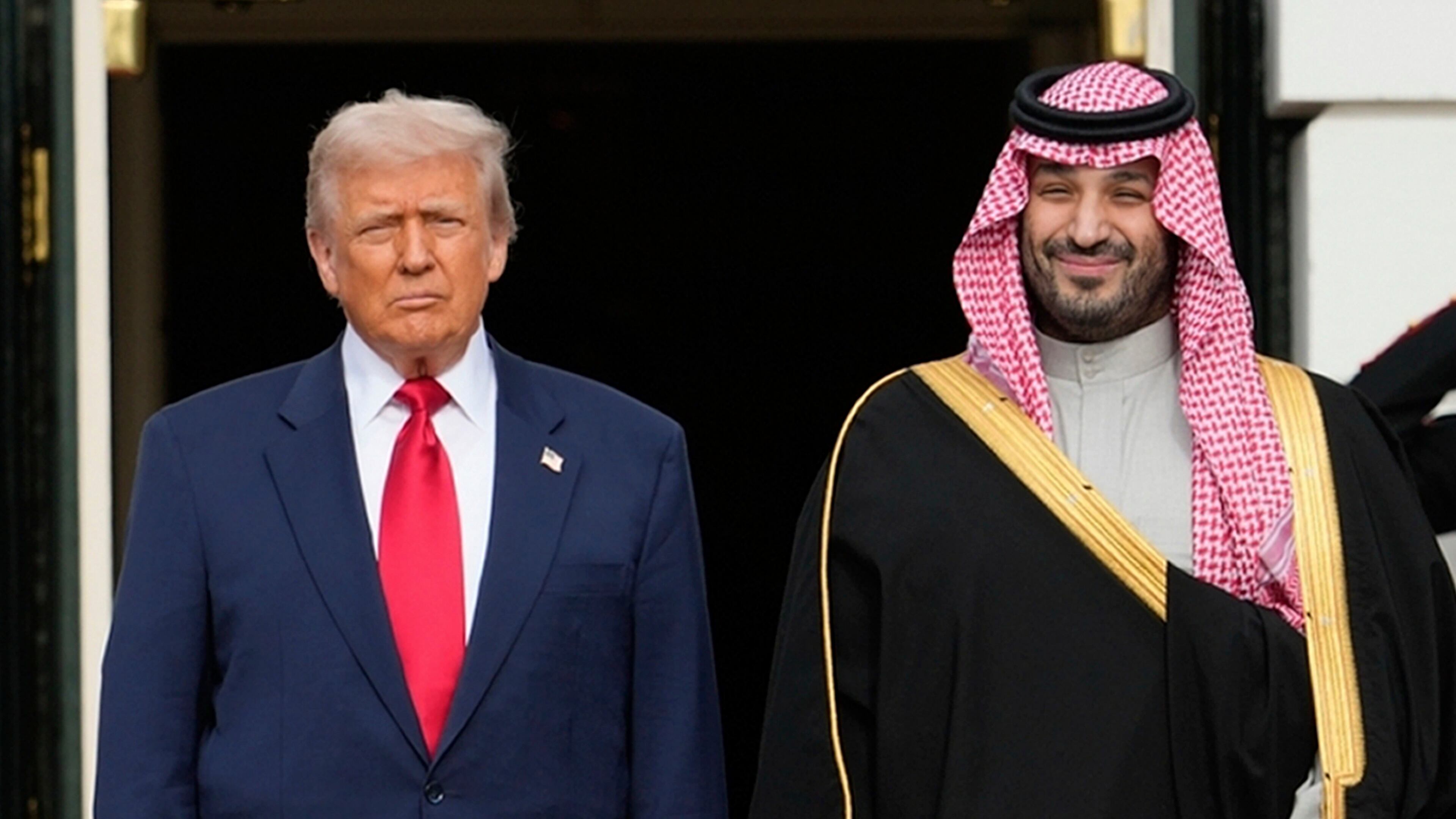 FILE - President Donald Trump stands with Saudi Arabia's Crown Prince Mohammed bin Salman on his visit to the White House, Nov. 18, 2025, in Washington. (AP Photo/Mark Schiefelbein, File)