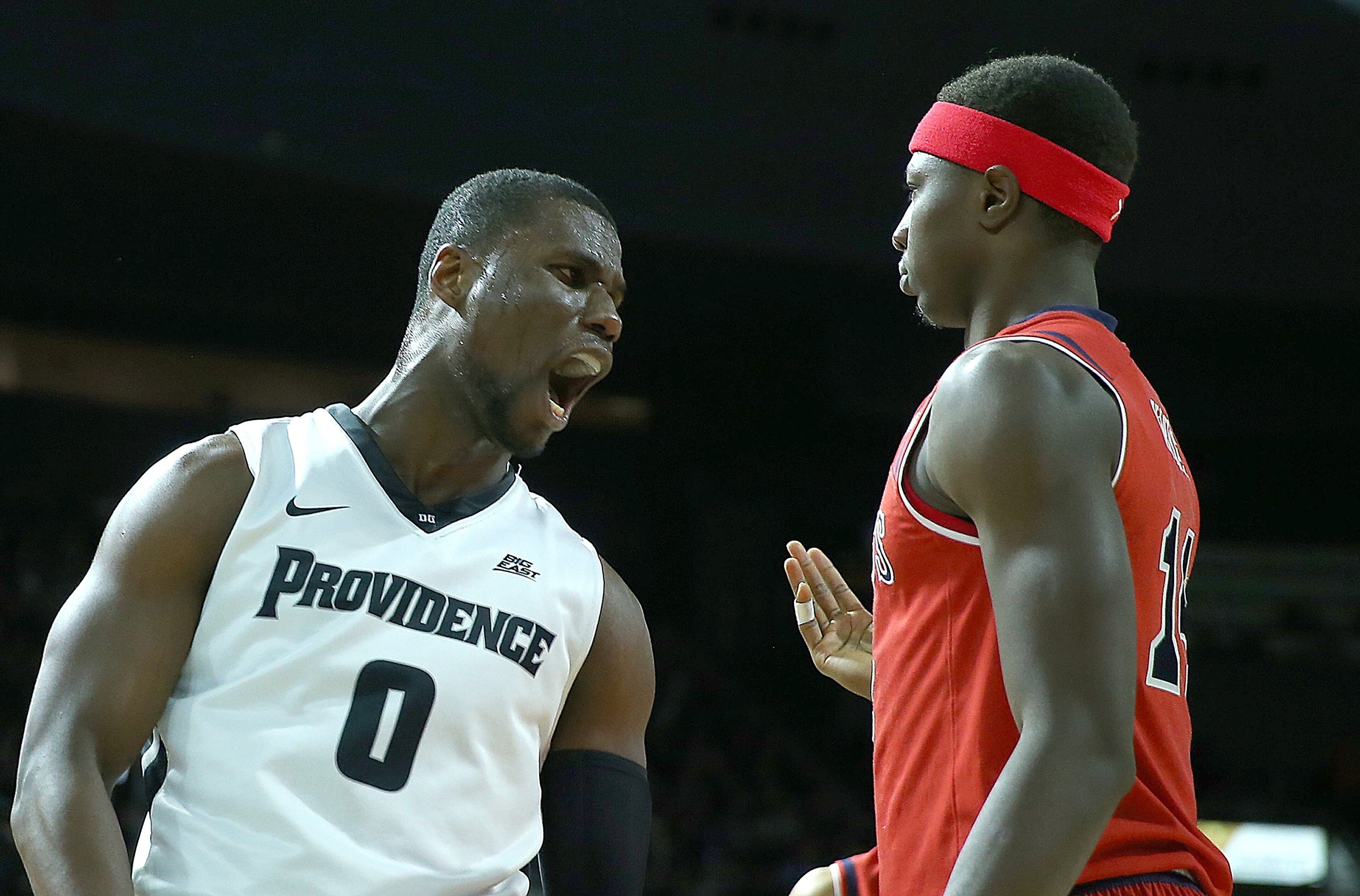 Ben Bentil. Here, Bentil (0) after he scored against Tariq Owens of St. John's on January 2, 2016, at the Dunkin' Donuts Center in Providence, Rhode Island. (Photo by Jim Rogash/Getty Images)