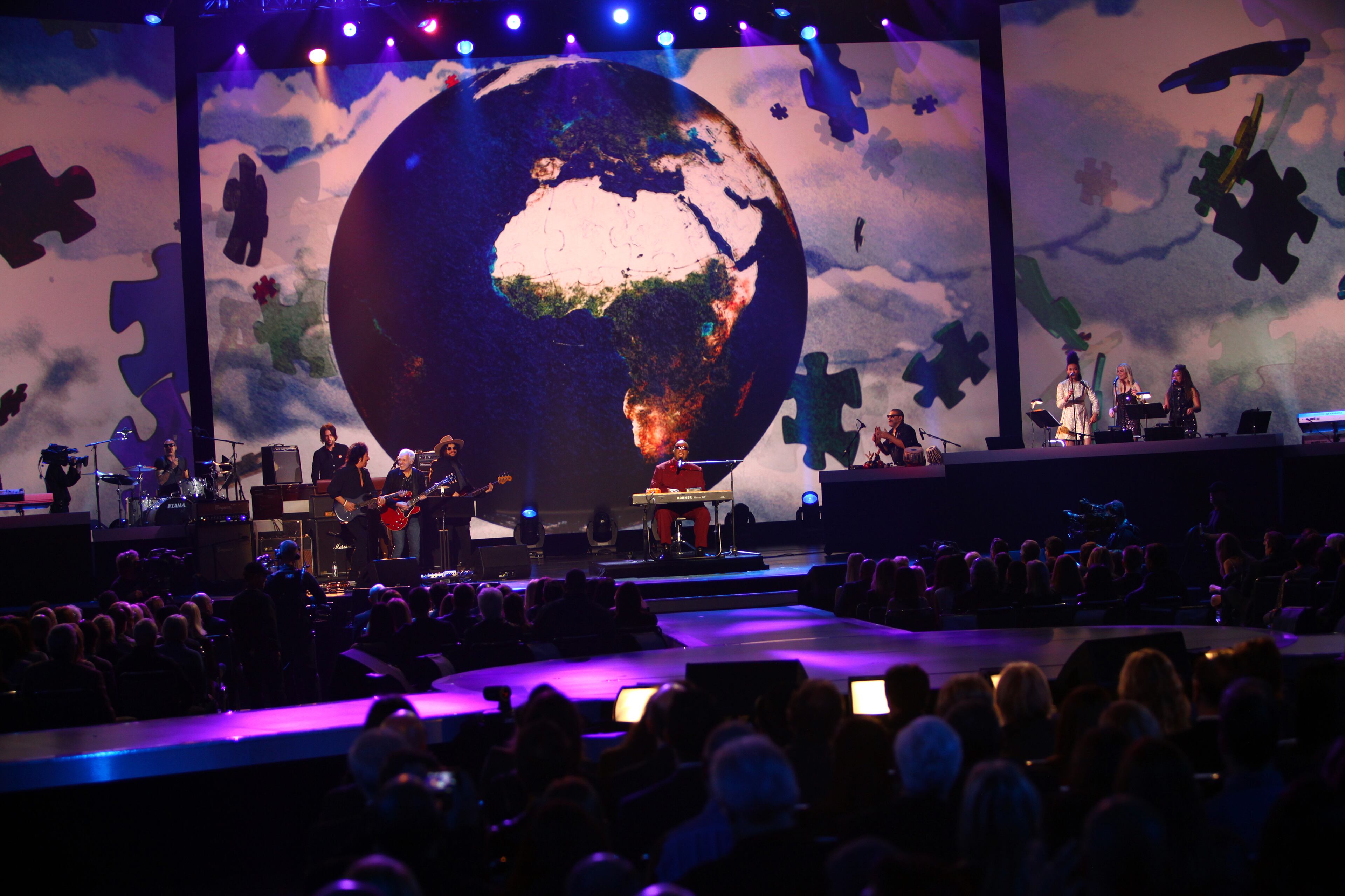 Stevie Wonder performs at The Night that Changed America: A Grammy Salute to the Beatles, on Monday, Jan. 27, 2014, in Los Angeles. (Photo by Zach Cordner/Invision/AP)