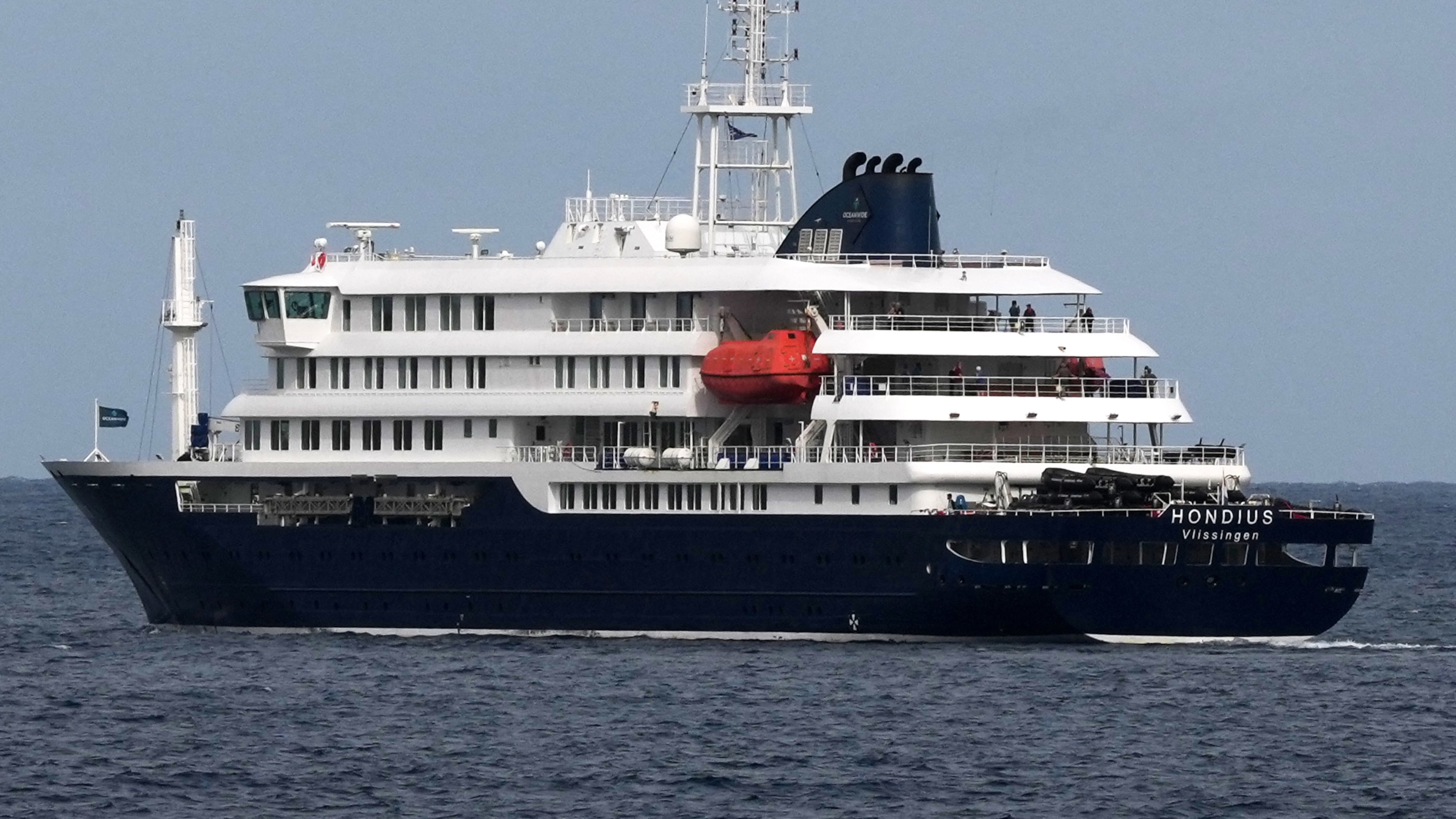 The MV Hondius cruise ship departs the port in Praia, Cape Verde, Wednesday, May 6, 2026. (AP Photo/Misper Apawu)