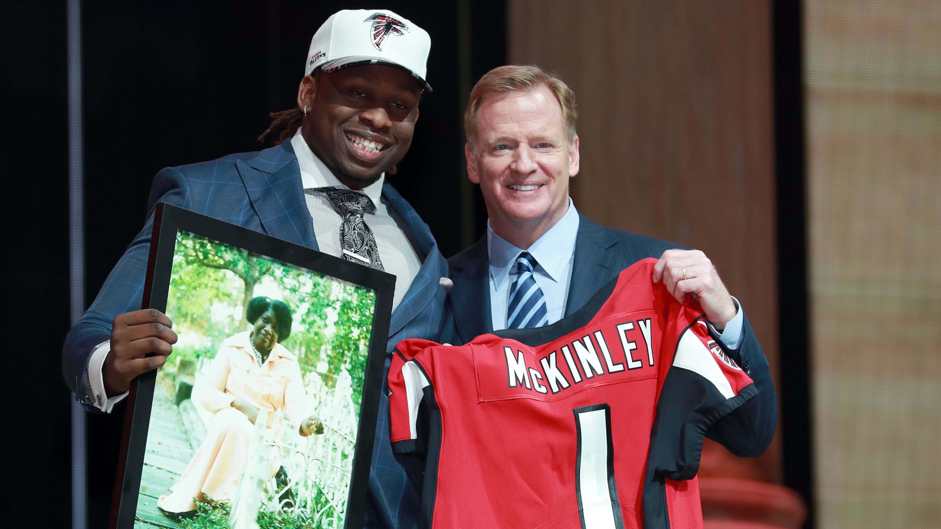 UCLA’s Takkarist McKinley, left, poses with NFL commissioner Roger Goodell after being selected by the Falcons during the first round of the NFL draft, Thursday, April 27, 2017, in Philadelphia. (Jeff Haynes/AP Images for Panini)