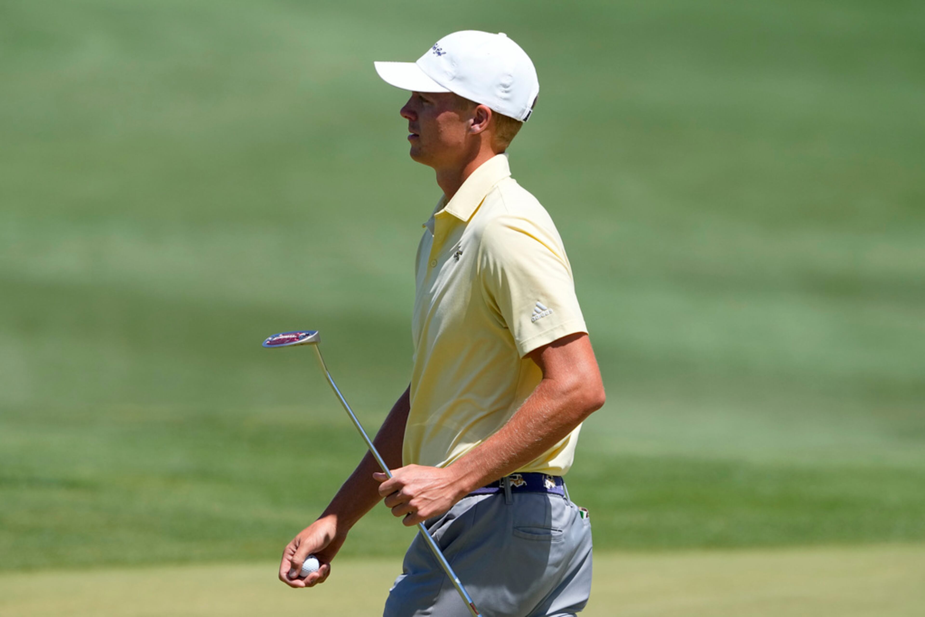 Georgia Tech golfer Connor Howe walks off the second green during the final round of the NCAA college men's match play golf championship, Wednesday, May 31, 2023, in Scottsdale, Ariz. (AP Photo/Matt York)