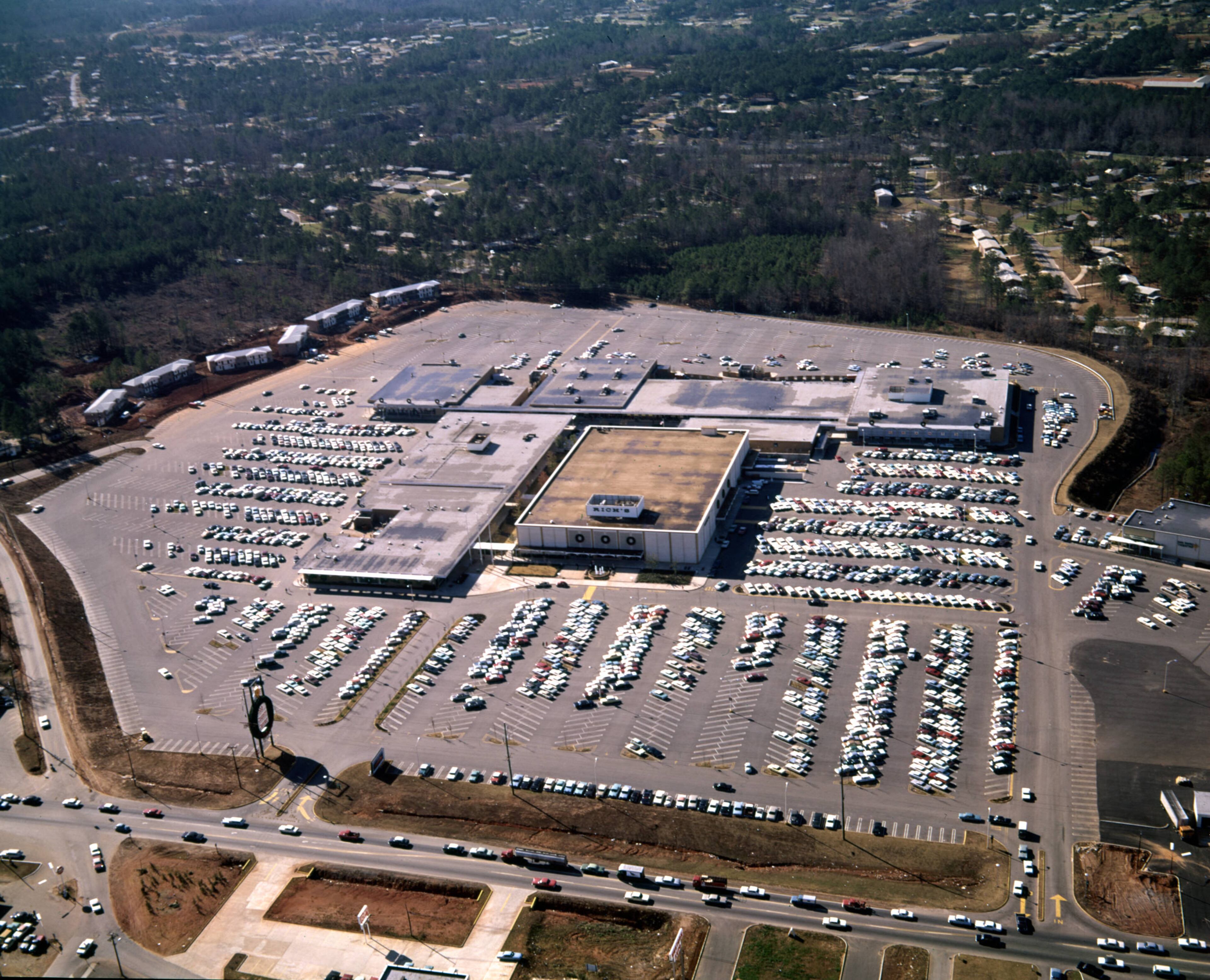 Aerial view of the Cobb County Shopping Center and its surrounding parking lot, with a view towards Rich's and Grant's, Smyrna, Georgia, December 21, 1965.