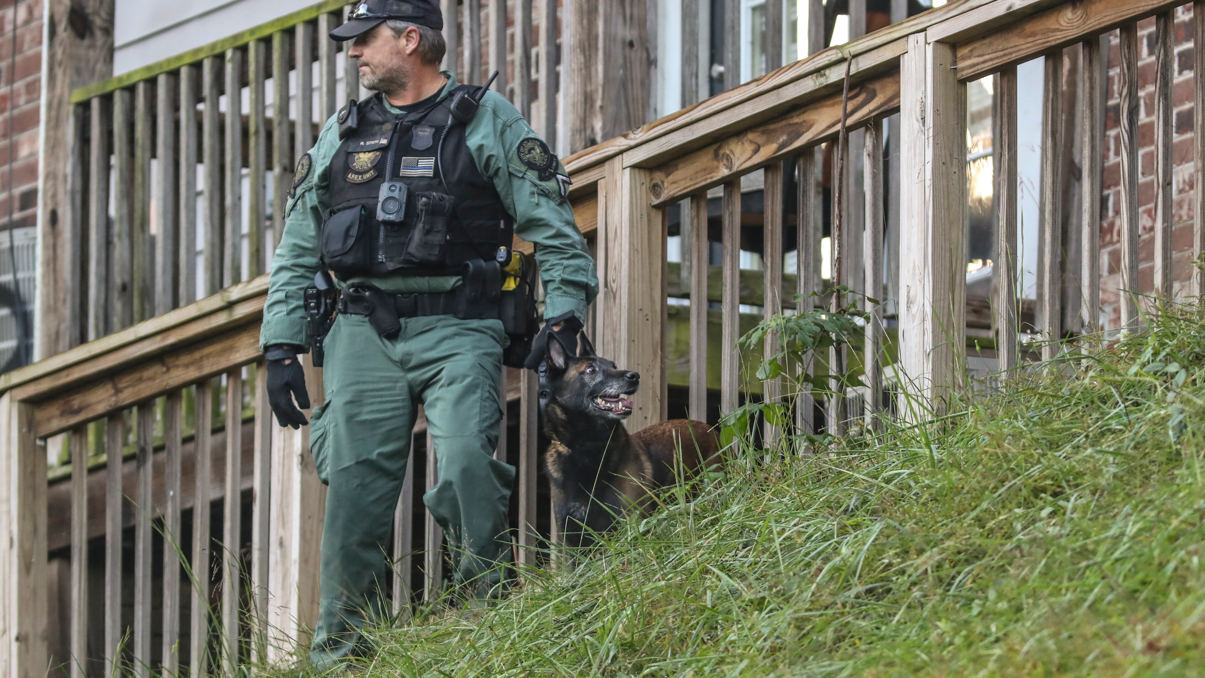 Authorities have charged two people in the fatal shooting of a 59-year-old grandmother as she slept in her southwest Atlanta apartment last week.