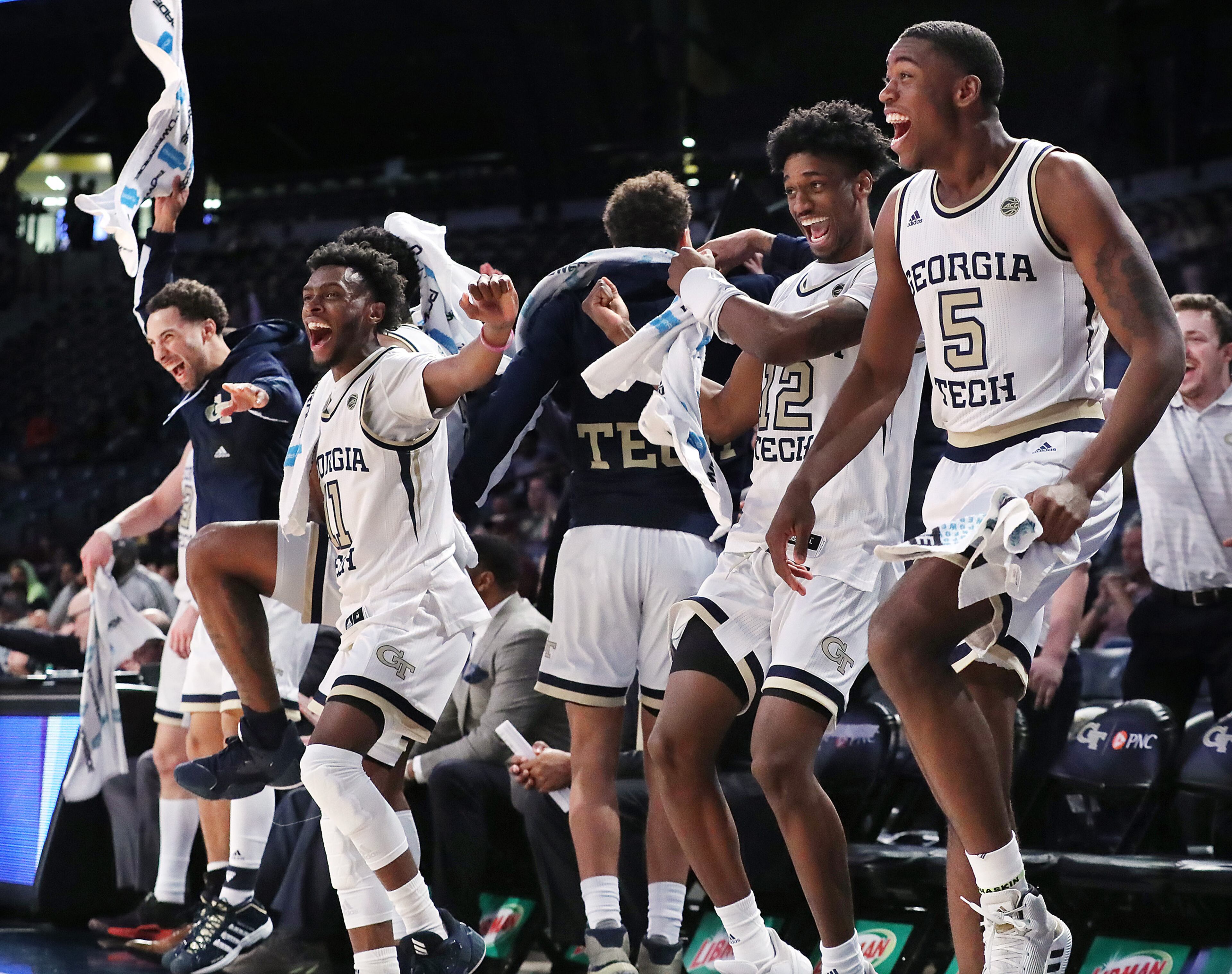 Georgia Tech players (from left) Jose Alvarado, Bubba Parham, Khalid Moore and Moses Wright react as teammate Niko Broadway makes a reverse layup for a basket in the final minutes of a 82-54 victory over Morehouse in a NCAA college basketball game on Tuesday, January 28, 2020, in Atlanta. Curtis Compton ccompton@ajc.com