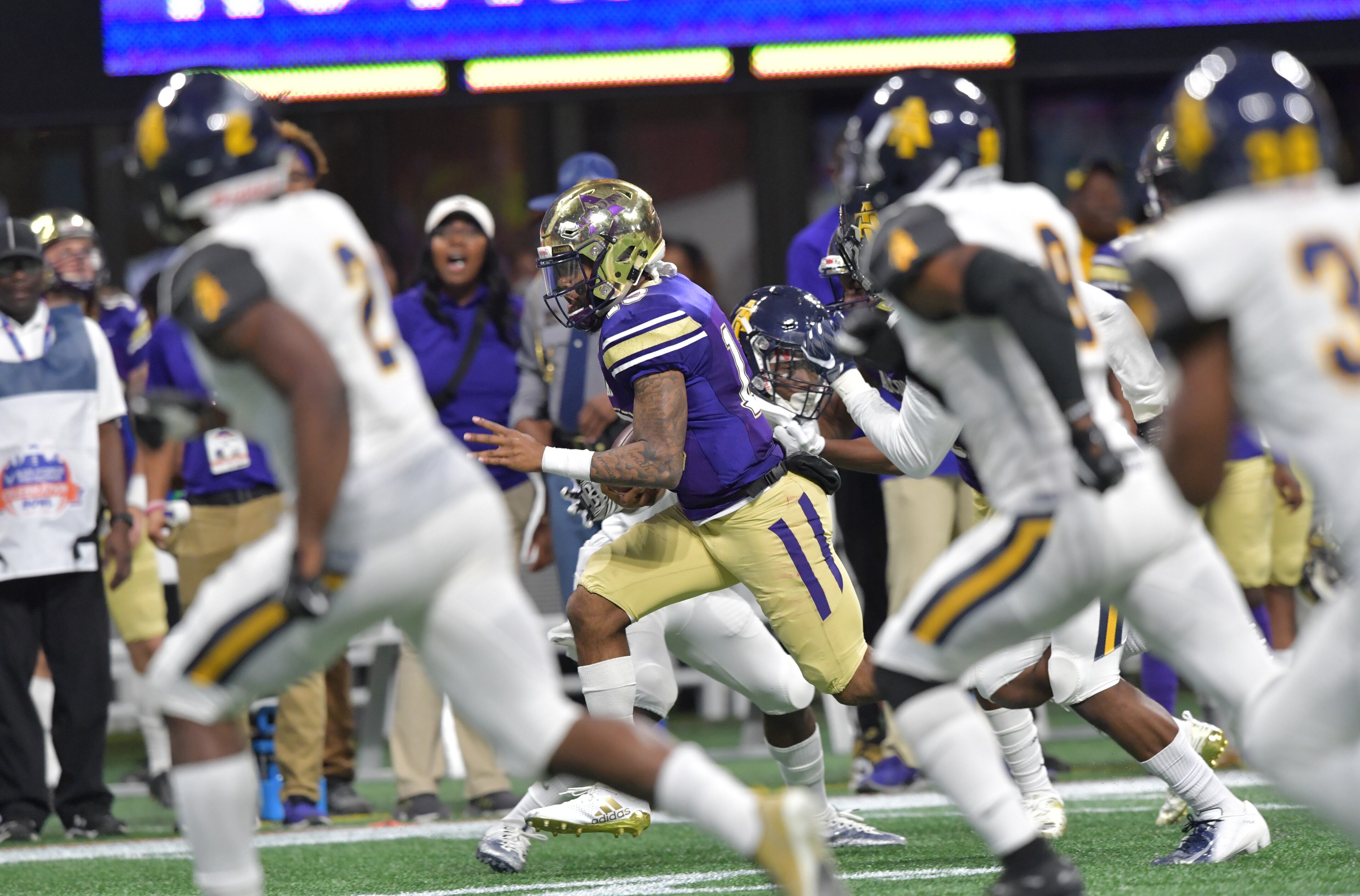 December 15, 2018 Atlanta - Alcorn State quarterback Noah Johnson (13) runs for a touchdown during the second half of the 2018 Celebration Bowl at Mercedes-Benz Stadium on Saturday, December 15, 2018. North Carolina A&T won 24-22 over the Alcorn State. HYOSUB SHIN / HSHIN@AJC.COM