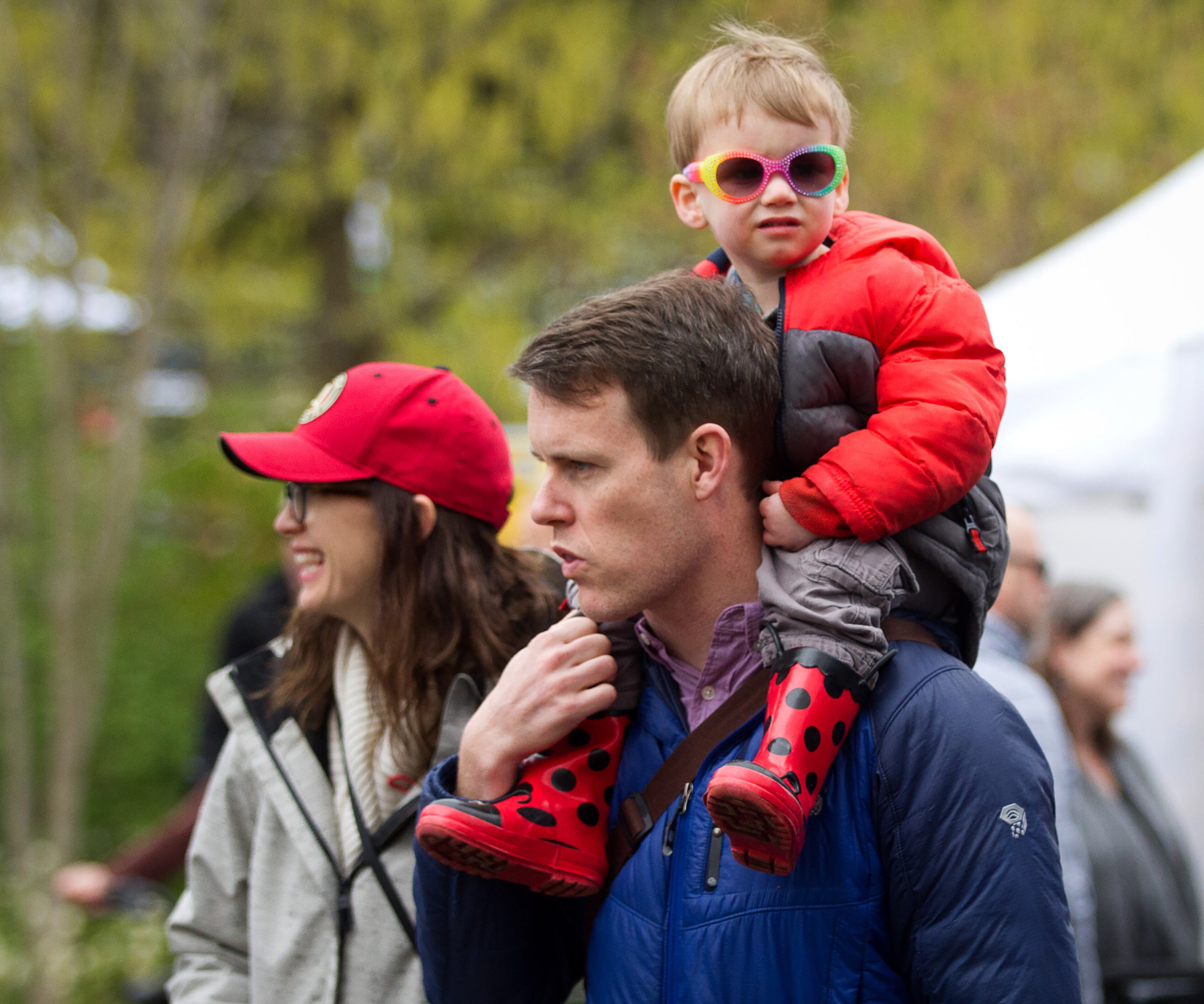 Conner Dupree, 2, gets a ride on his fathers, Pat Dupree's shoulders during The Festival on Ponce in Atlanta GA Sunday, April 8, 2018. STEVE SCHAEFER / SPECIAL TO THE AJC