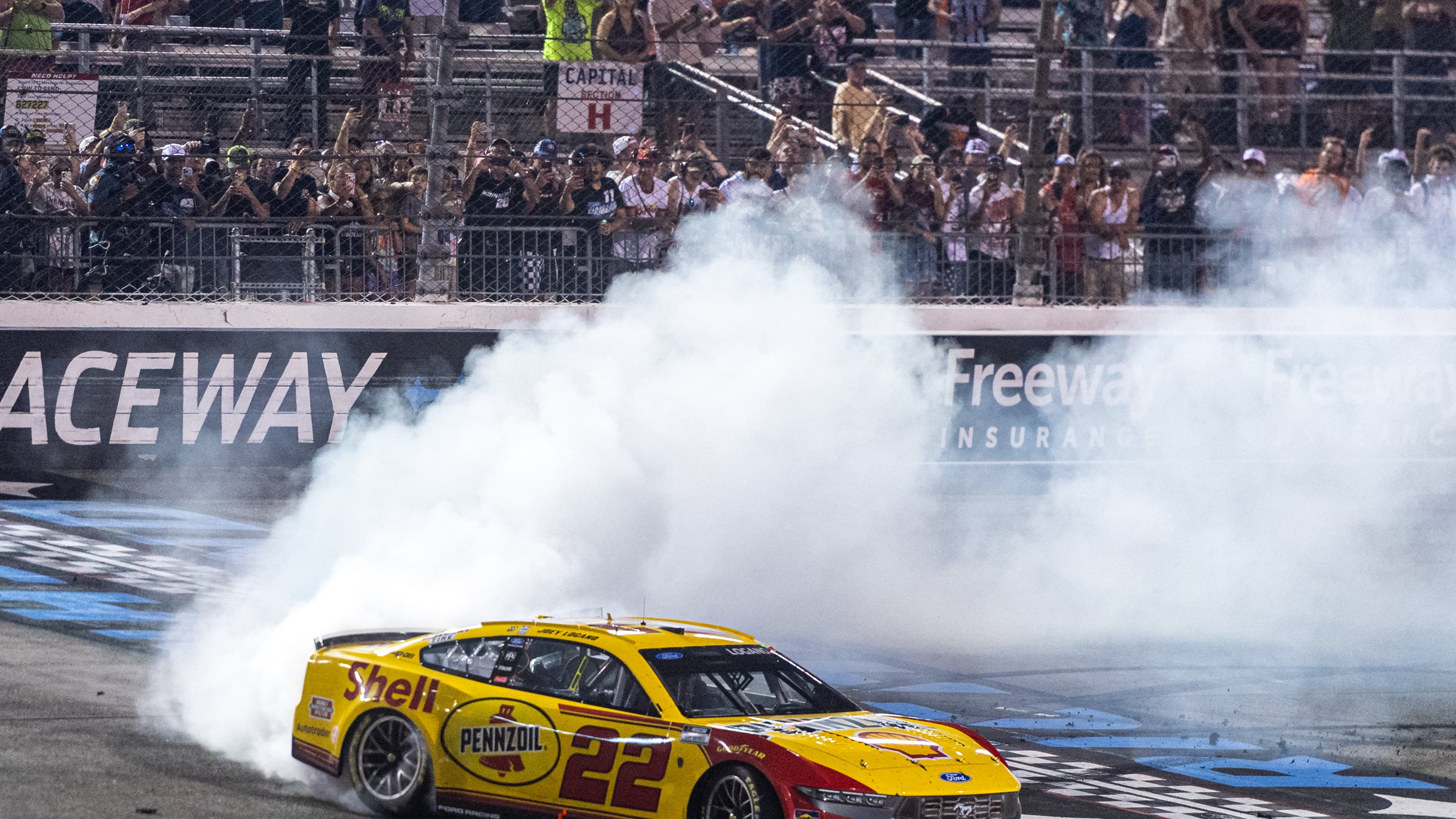 Team Penske driver Joey Logano (22) wins the Cook Out 400 at Richmond Raceway, Saturday, Aug. 15, 2026, in Richmond Va. (AP Photo/Robert Simmons)