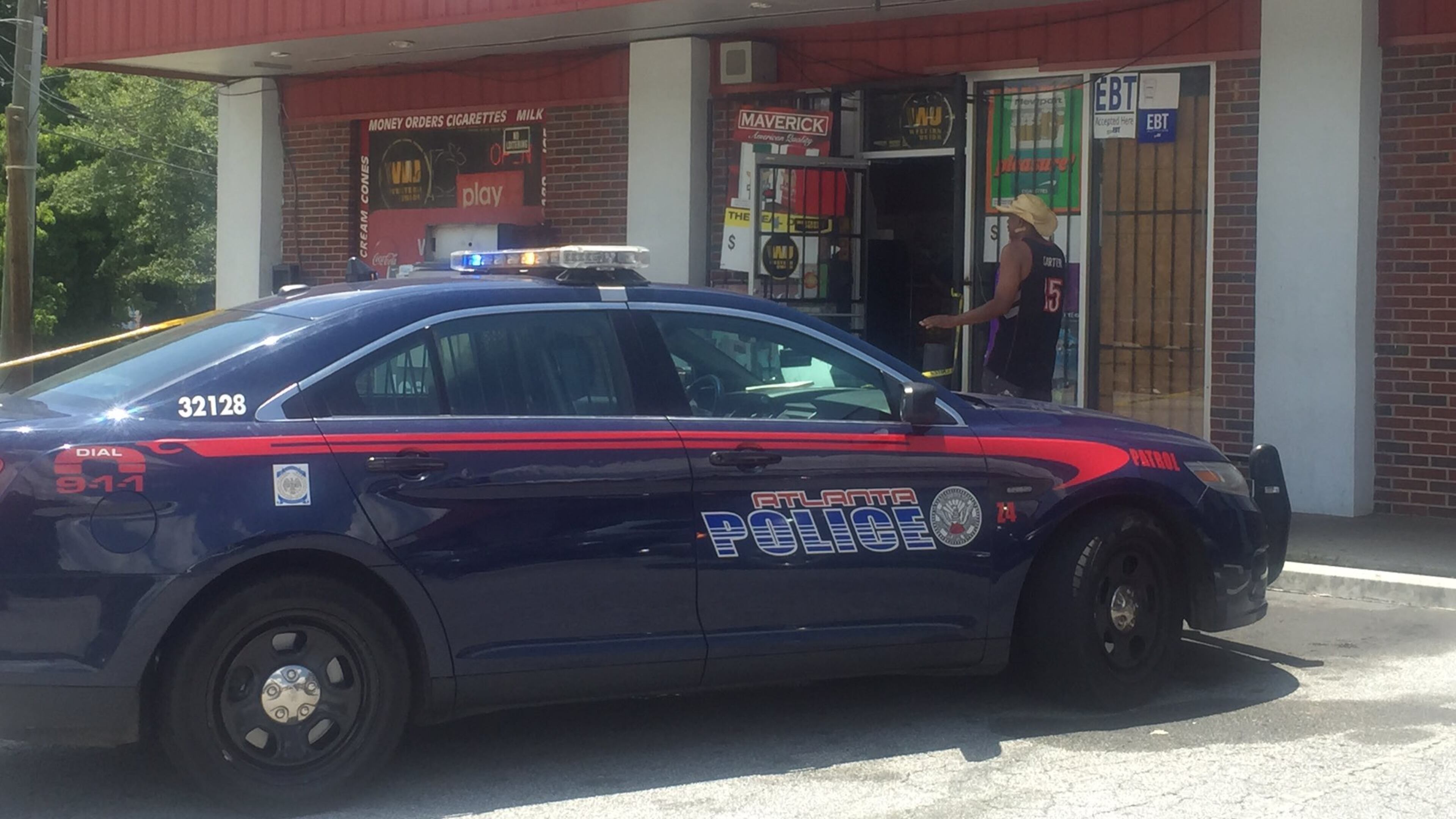 Chukwujekwu Okeke, a clerk at Anago Food Mart on Cascade Avenue, was busy stocking shelves when two men walked inside with a gun and confronted him. (Credit: Channel 2 Action News)
