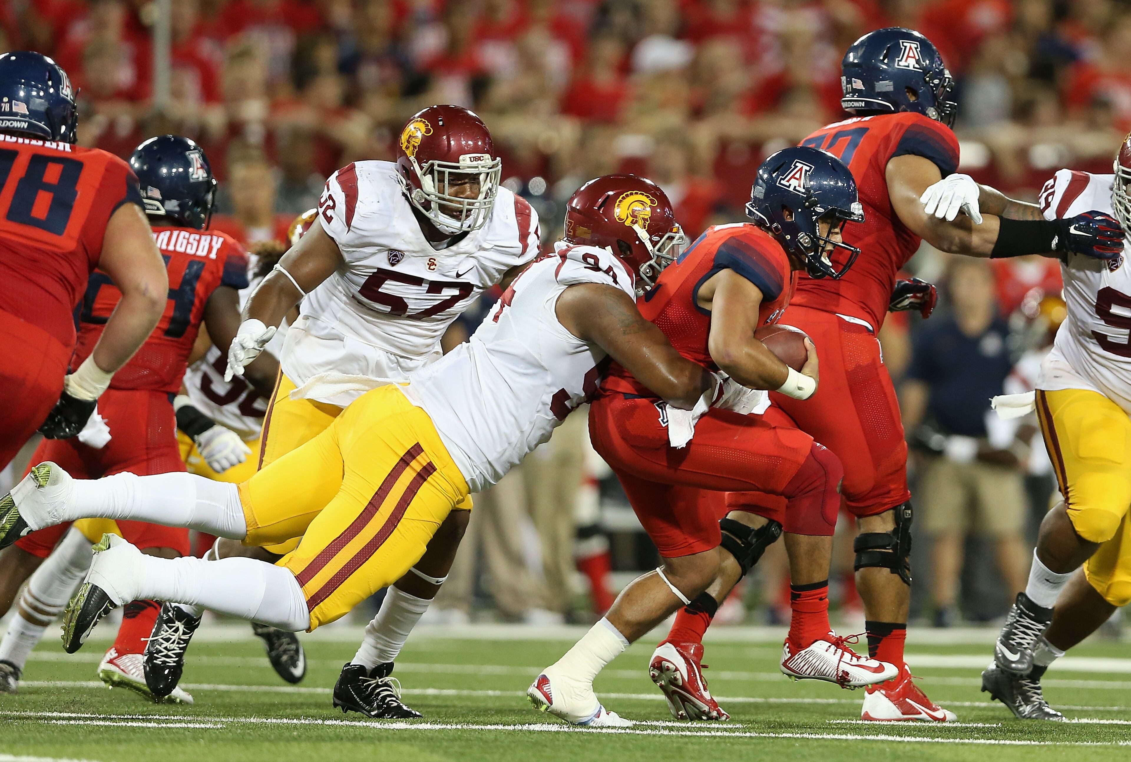 Leonard Williams, USC. He likely will be long gone before the eighth pick, and could go No. 1. Here he sacks Anu Solomon of Arizona last October. (Photo by Christian Petersen/Getty Images)