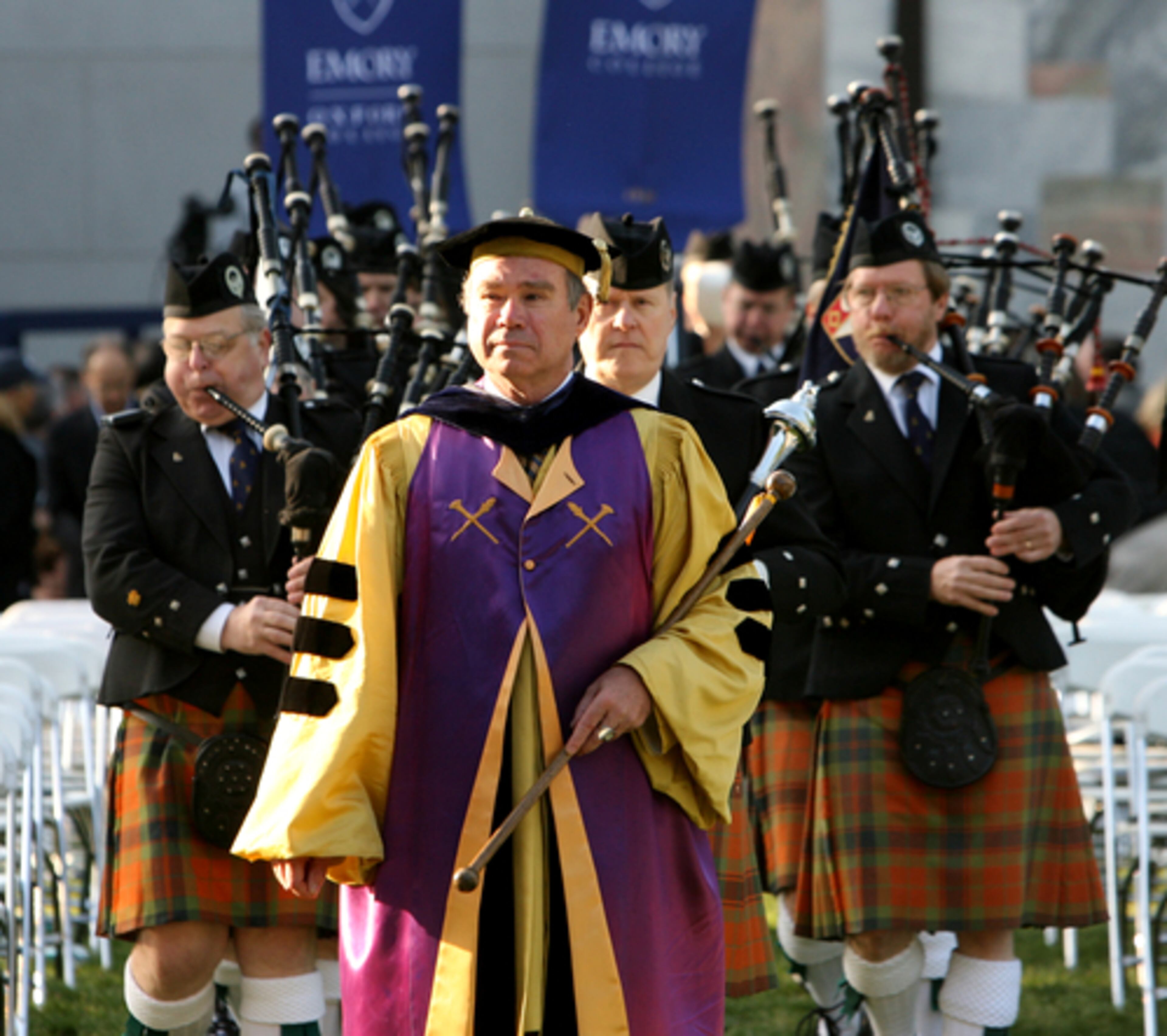 Deputy University Marshall for Emory College Larry Taulbee leads the Atlanta Pipe Band in the procession Monday.