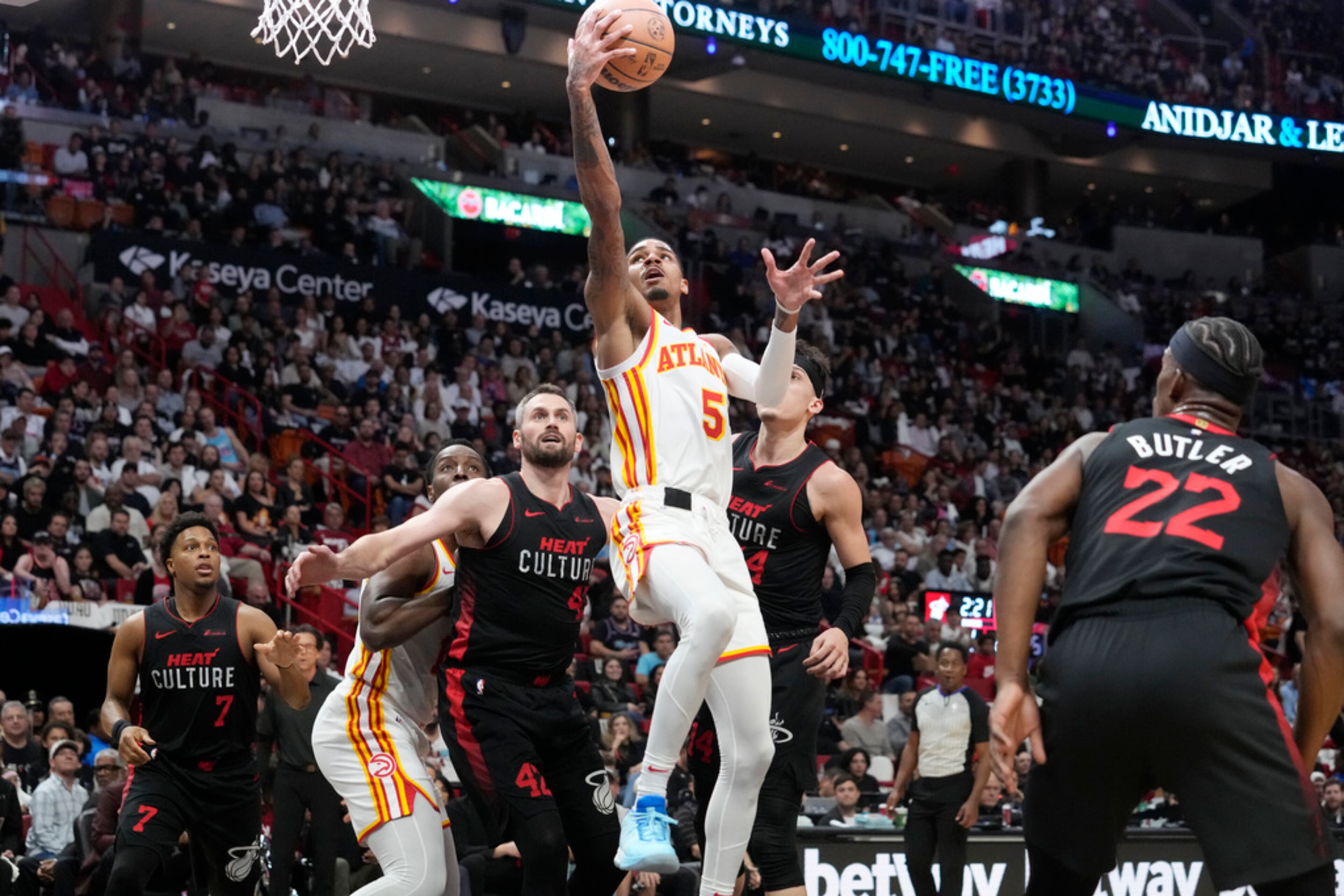 Atlanta Hawks guard Dejounte Murray (5) drives to the basket during the first half of an NBA basketball game against the Miami Heat, Friday, Jan. 19, 2024, in Miami. (AP Photo/Marta Lavandier)