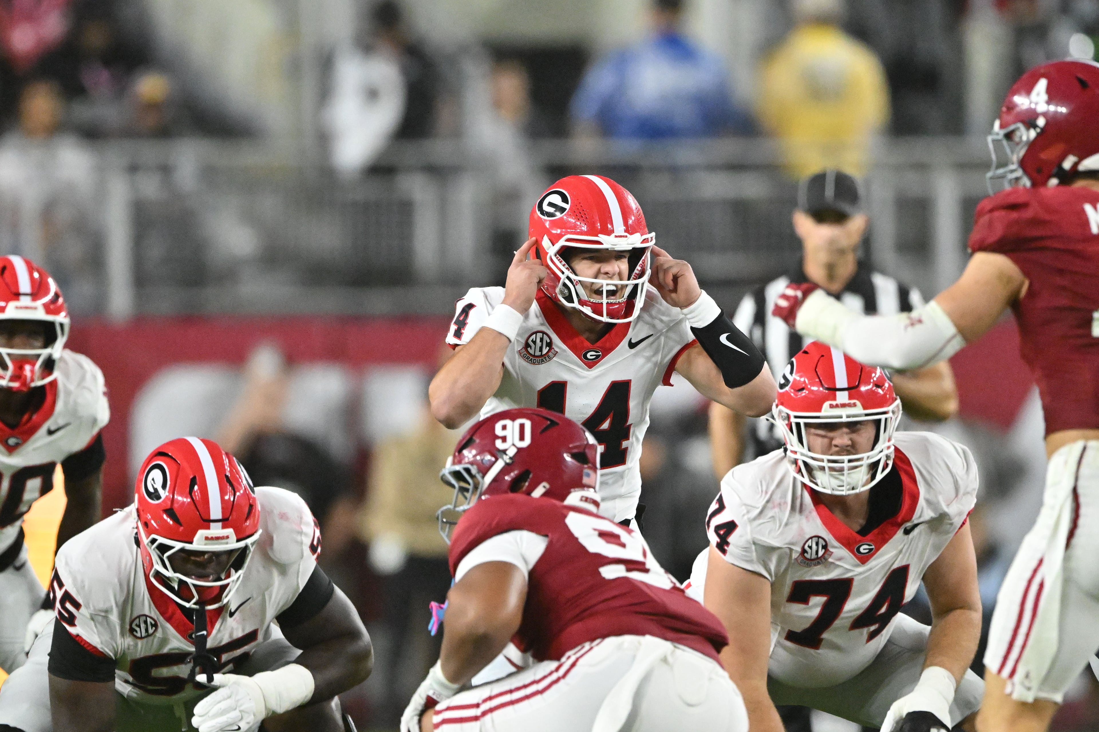 Georgia quarterback Gunner Stockton (center) shouts instructions during the first half in an NCAA football game at Bryant-Denny Stadium on Saturday, Oct. 10, 2026, in Tuscaloosa, Alabama. (Hyosub Shin/AJC)