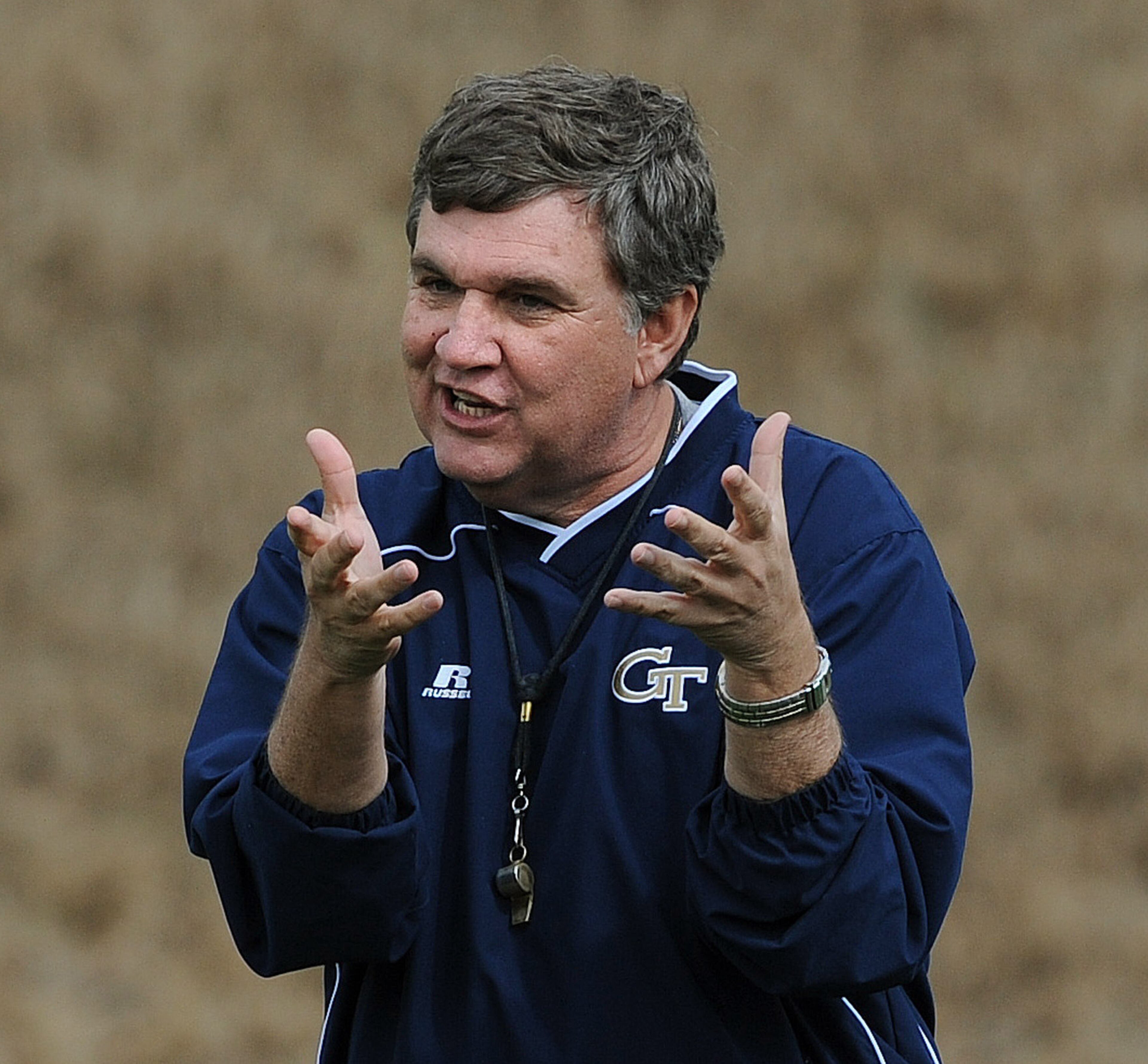 Georgia Tech coach Paul Johnson uses his hands to make a point during the first day of spring football practice at Georgia Tech on Monday, March 29, 2010. Johnny Crawford, jcrawfordajc.com