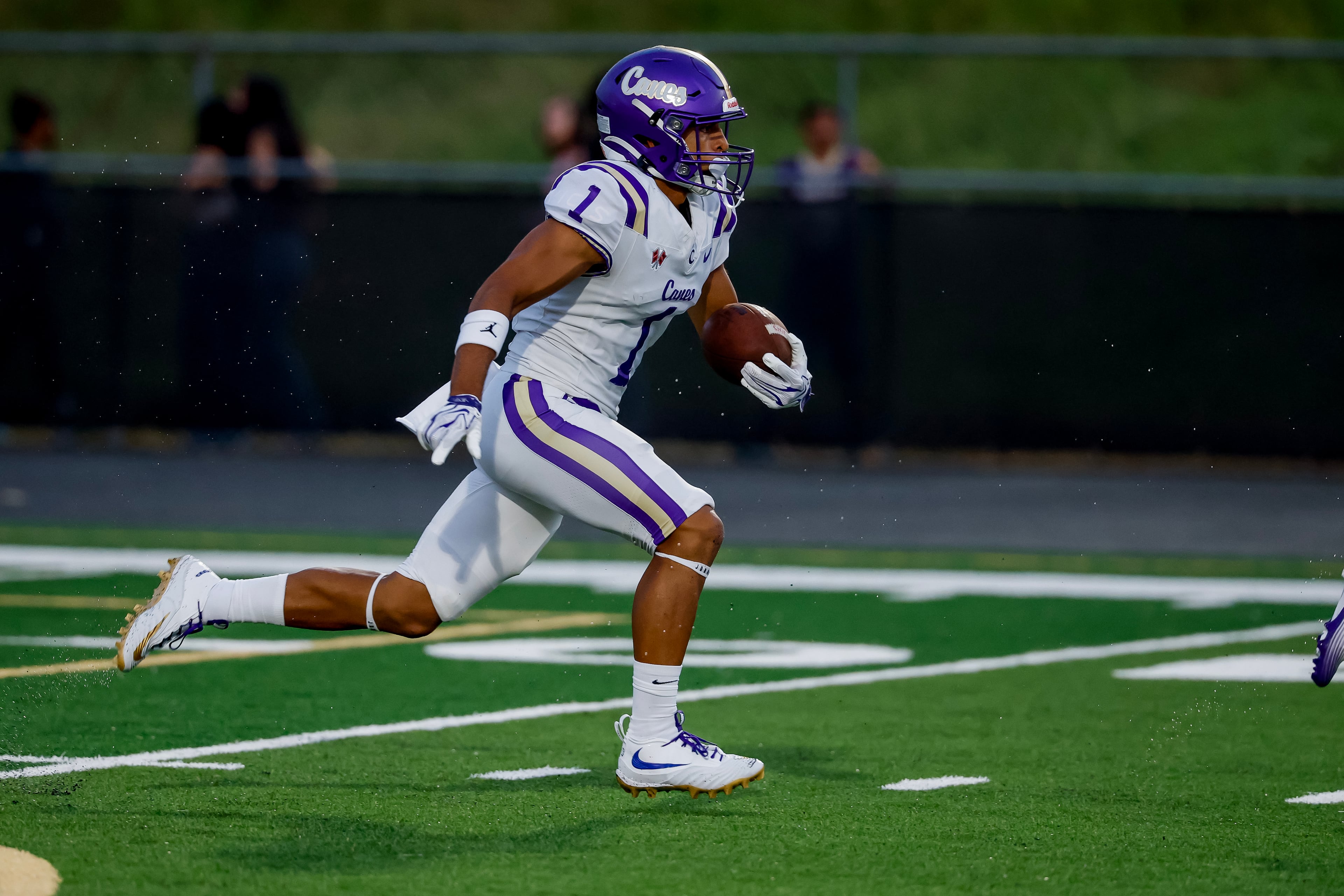 Cartersville wide receiver Madoxx Davis returns the opening kickoff against Hiram on Friday, Aug. 21, 2026, in Hiram. (Erik S. Lesser for the AJC)