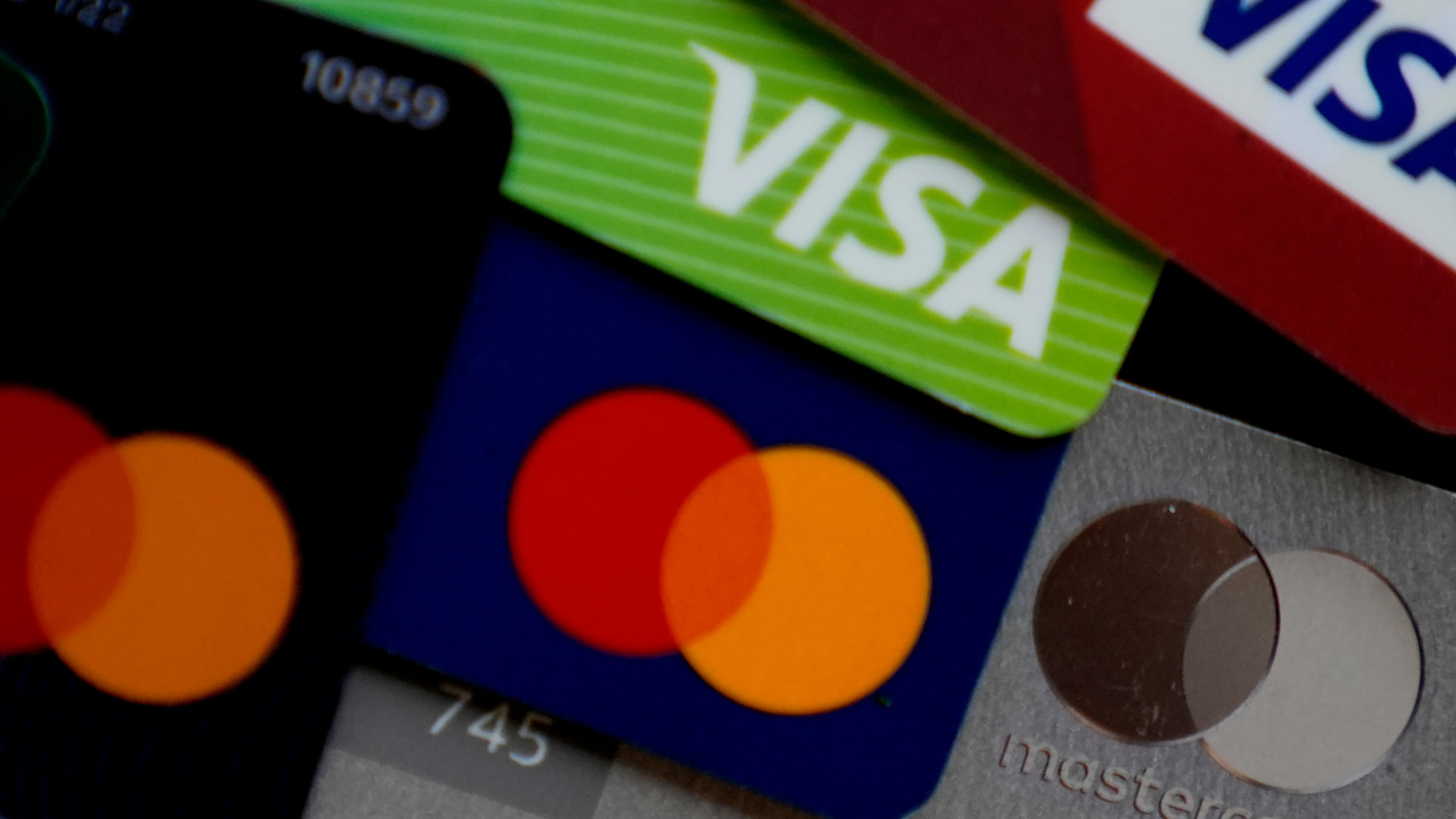 FILE - Visa and Mastercard credit cards are shown in Buffalo Grove, Ill., Feb. 8, 2024. (AP Photo/Nam Y. Huh, File)
