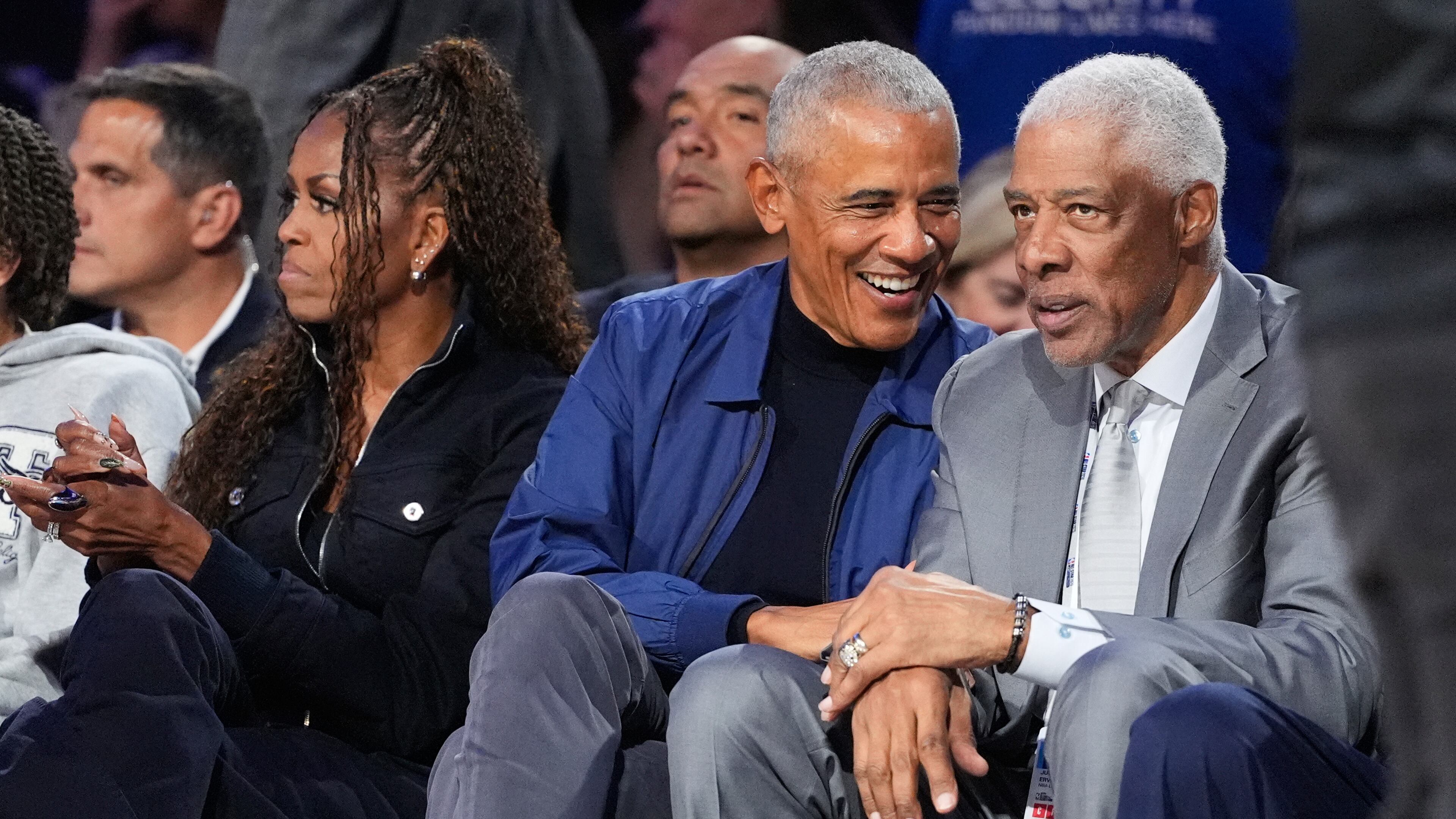 Barack Obama talks to Julius Erving during the NBA All-Star basketball game Sunday, Feb. 15, 2026, in Inglewood, Calif. (AP Photo/Mark J. Terrill)