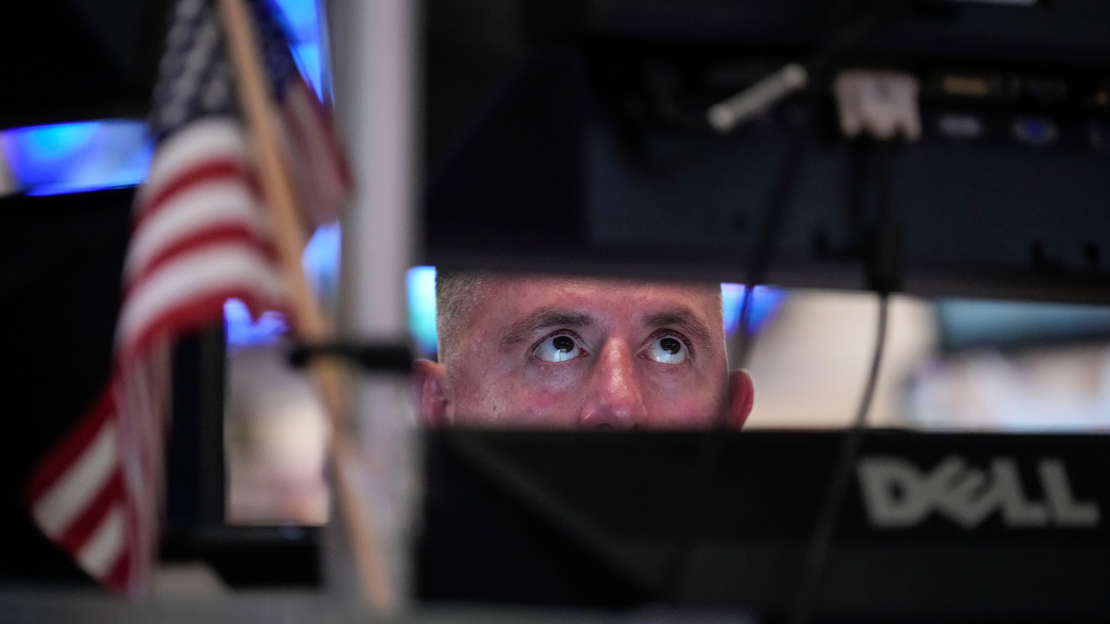 A trader works on the floor of the New York Stock Exchange, Thursday, July 30, 2026, in New York. (AP Photo/Yuki Iwamura)