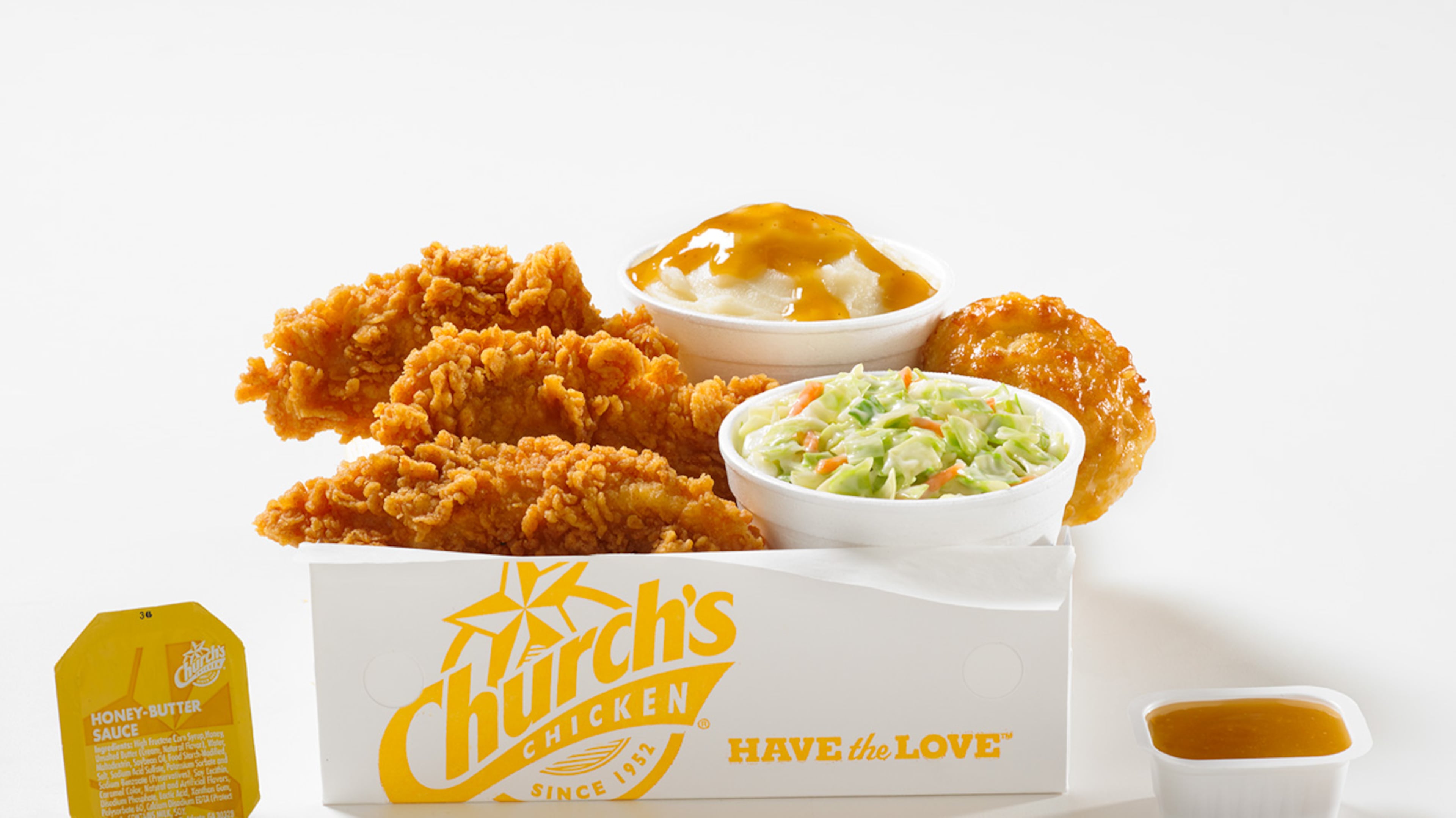 Honey-butter biscuit battered chicken tenders are available for a limited time at Church's Chicken. Sides like cole slaw and mashed potatoes are available for purchase too. Photo credit: Ink Link Marketing.