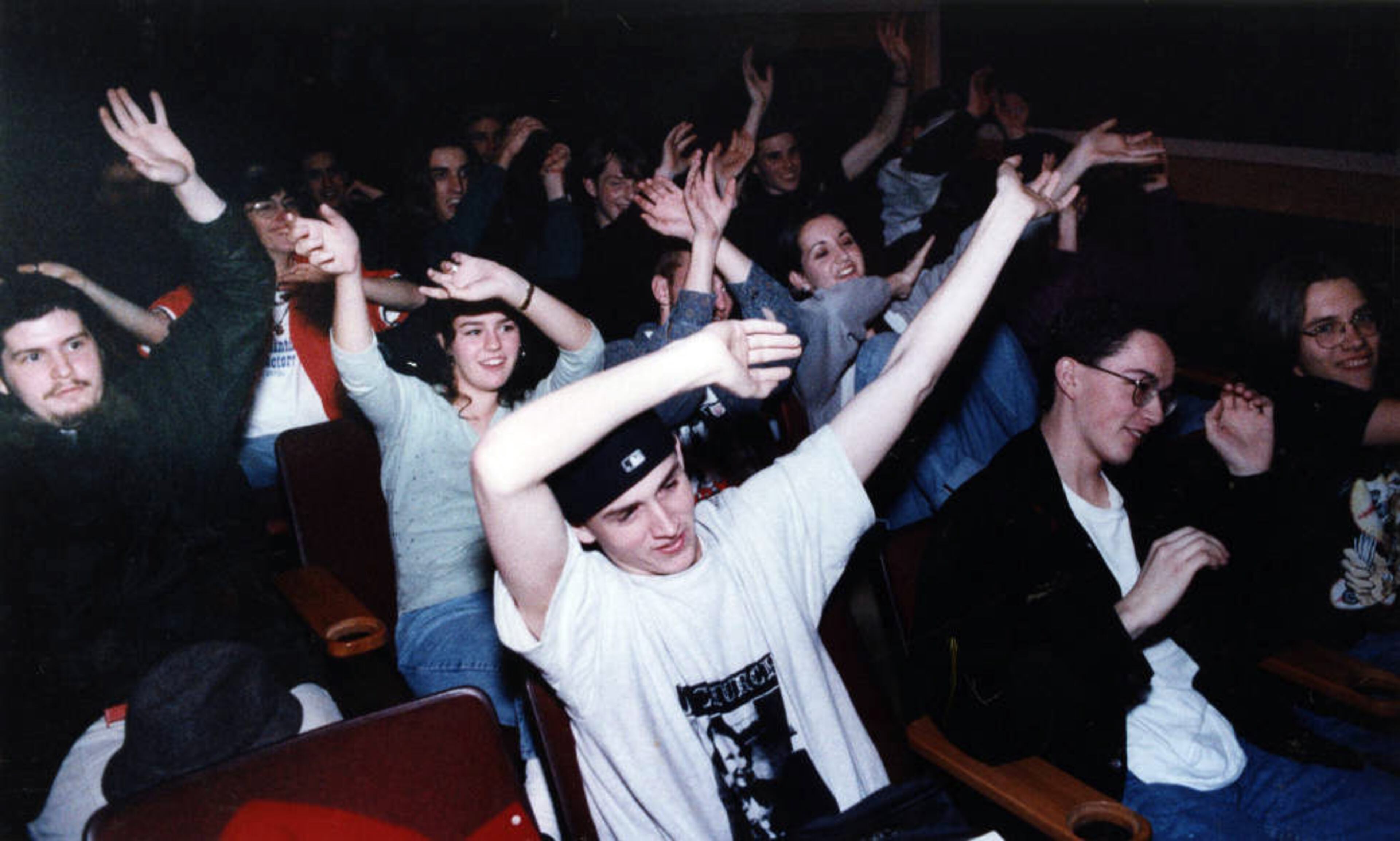 Audience members doing the Time Warp during a screening of "The Rocky Horror Picture Show" in November 1993 at the Northlake 8 AMC Theaters.