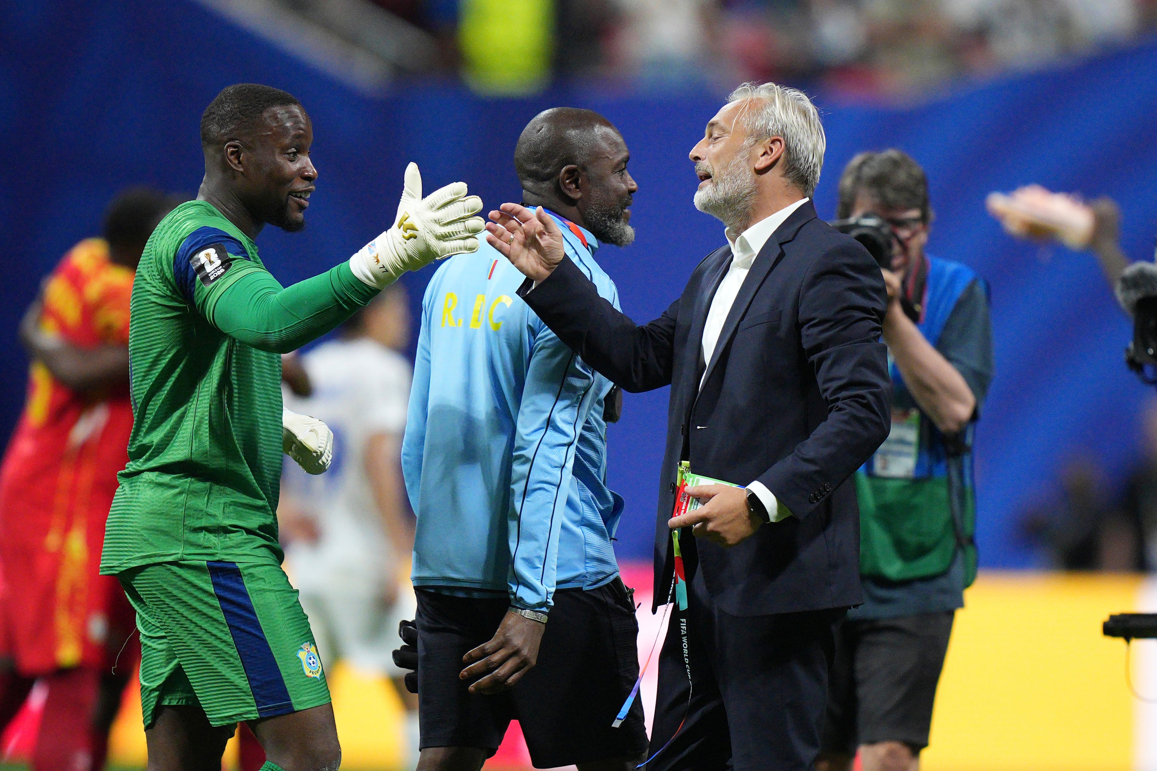 Congo goalkeeper Lionel Mpasi, left, celebrates with Congo manager Sebastien Desabre after the World Cup soccer match between Congo and Uzbekistan in Atlanta, Saturday, June 27, 2026. (Jacob Kupferman/AP)