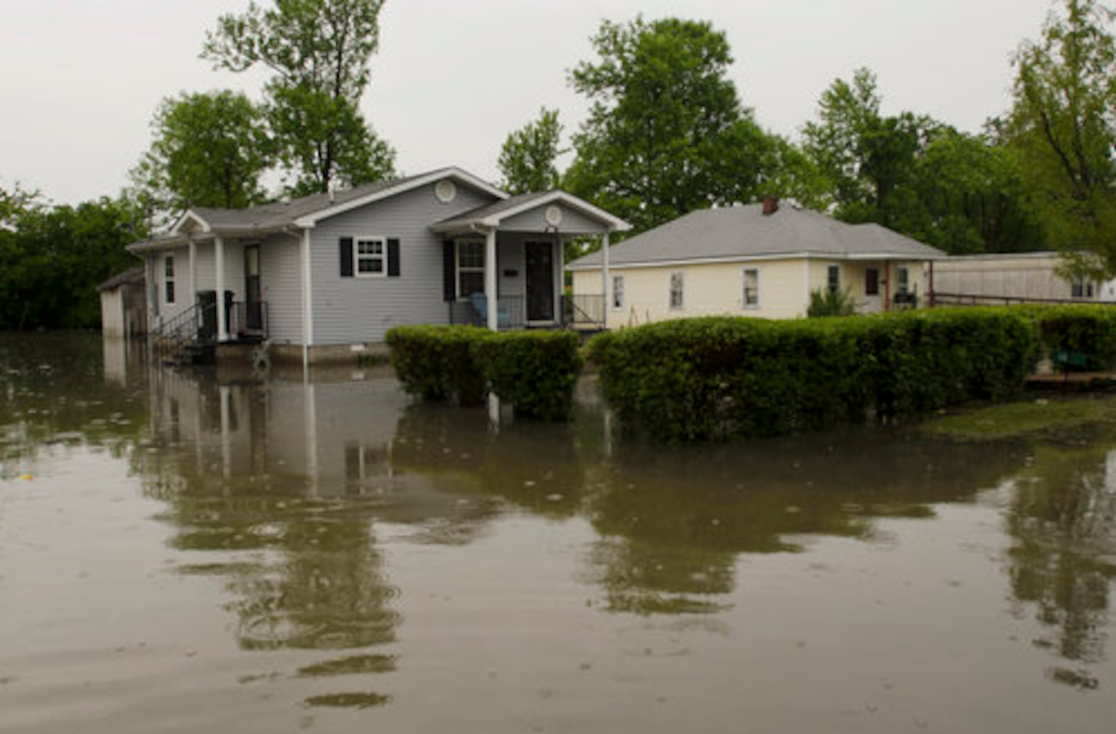 Floodwater from the Mississippi River approaches homes on the north end of Tiptonville, Tenn.