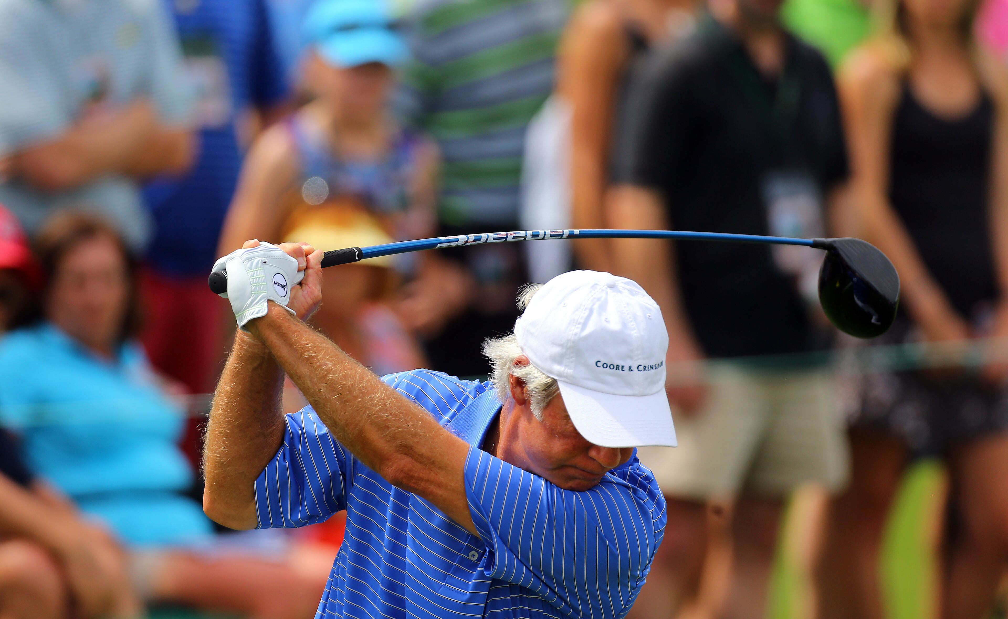 Ben Crenshaw hits from the #8 tee. Photos from the second round at the Masters Golf Tournament, Friday, April 10, 2015. CURTIS COMPTON/CCOMPTON@AJC.COM