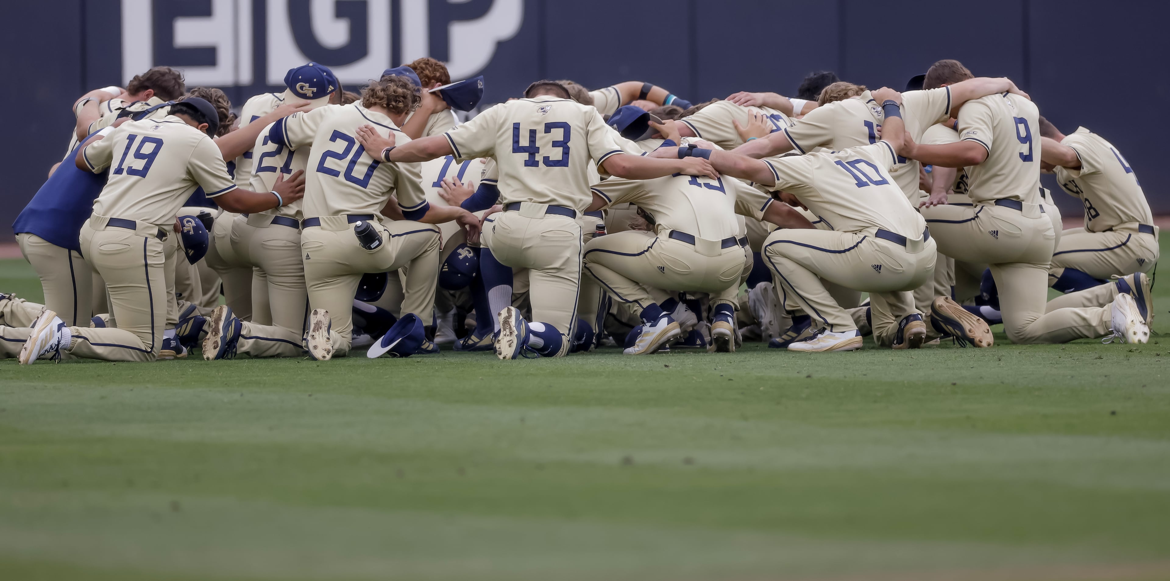 Georgia Tech baseball players gather in the outfield before the first pitch against Oklahoma in the Atlanta Regional game at Russ Chandler Stadium, Sunday, May 31, 2026, in Atlanta. (Erik S. Lesser for the AJC)