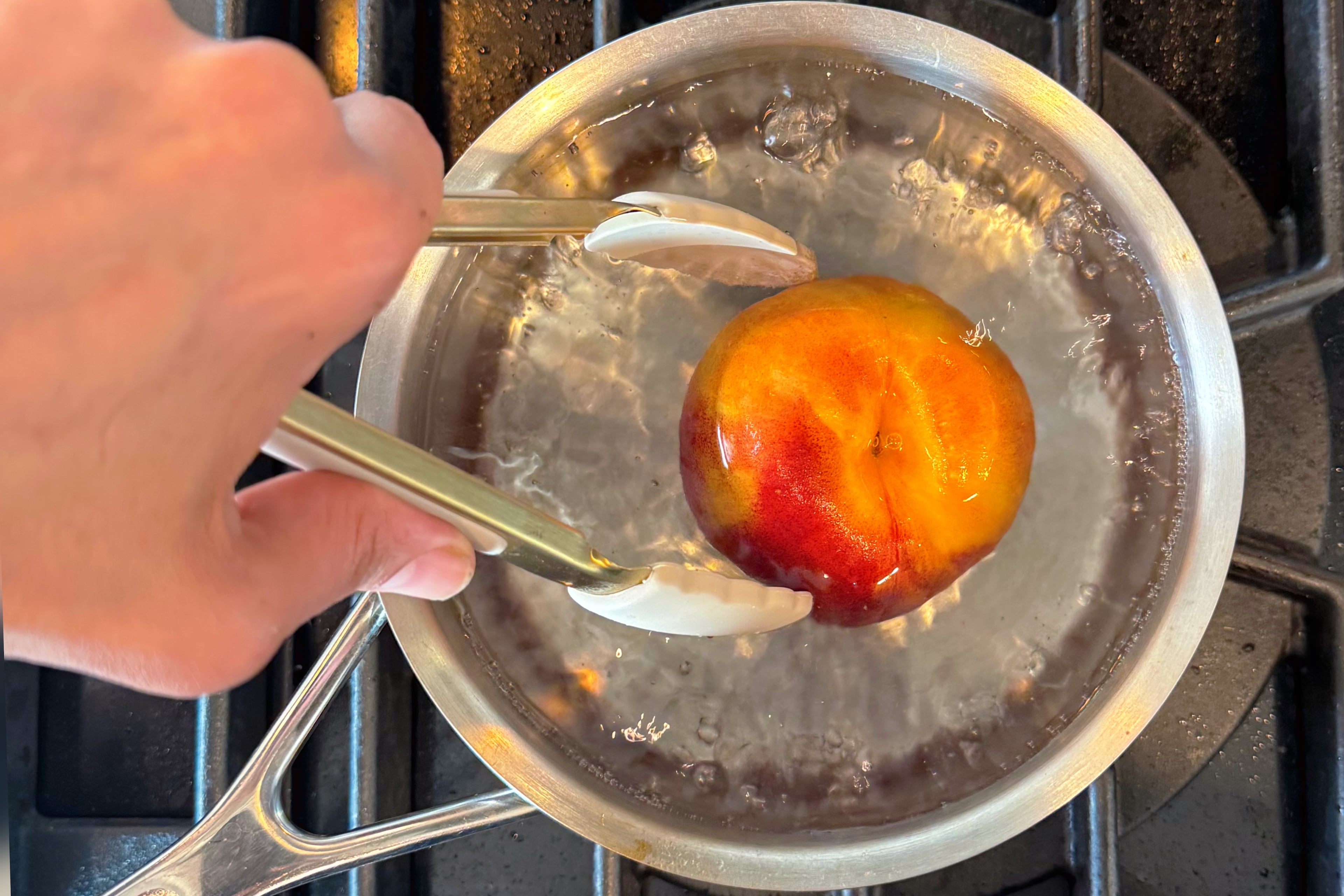 Pro tip: Score the bottom of a peach with a small x, boil for 10 seconds, and plunge in cool water for effortless peeling.